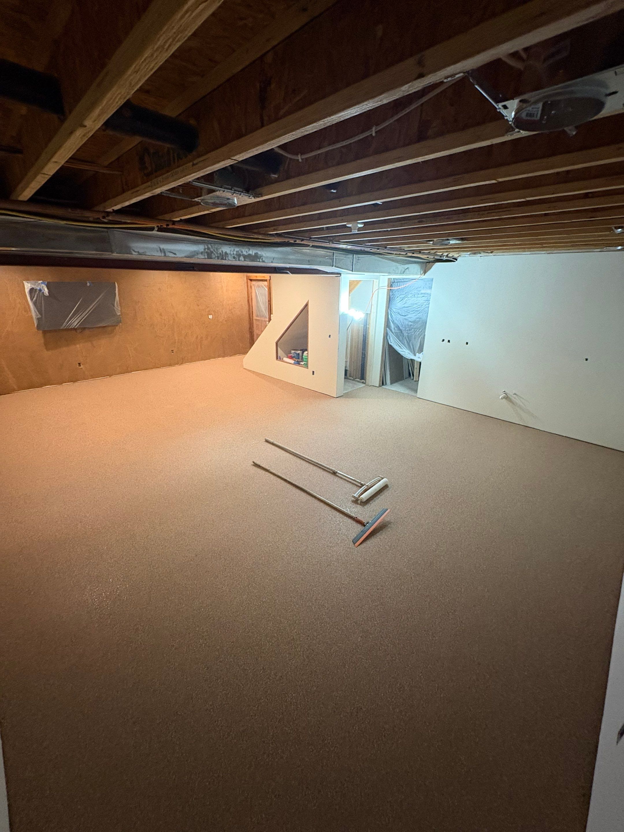 Custom Chip Concrete Coating for Colman Basement and Garage by Select Painting, Coatings & Garage Cabinets