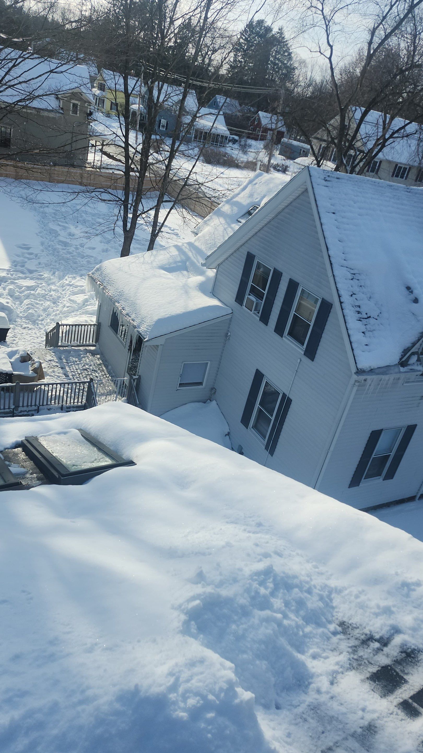 Ice Dam and snow removal by Mighty Dog Roofing of Greater Middlesex County