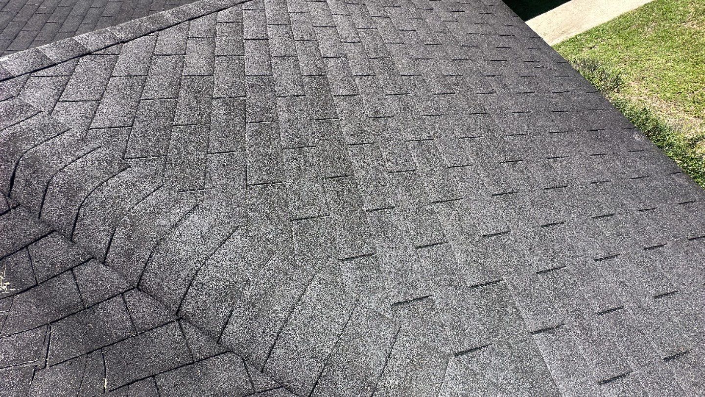 Residential Roofing Installation using Benton 26Ga 1inc Snapcock Metal Roof KYNAR Matte Black by Talya Roofing