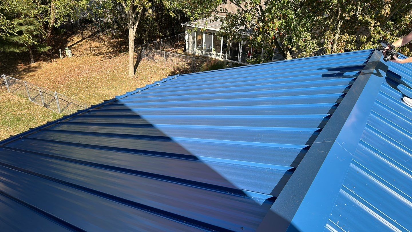Residential Roofing Installation using Standing Seam Metal - Gallary Blue by RoofX 