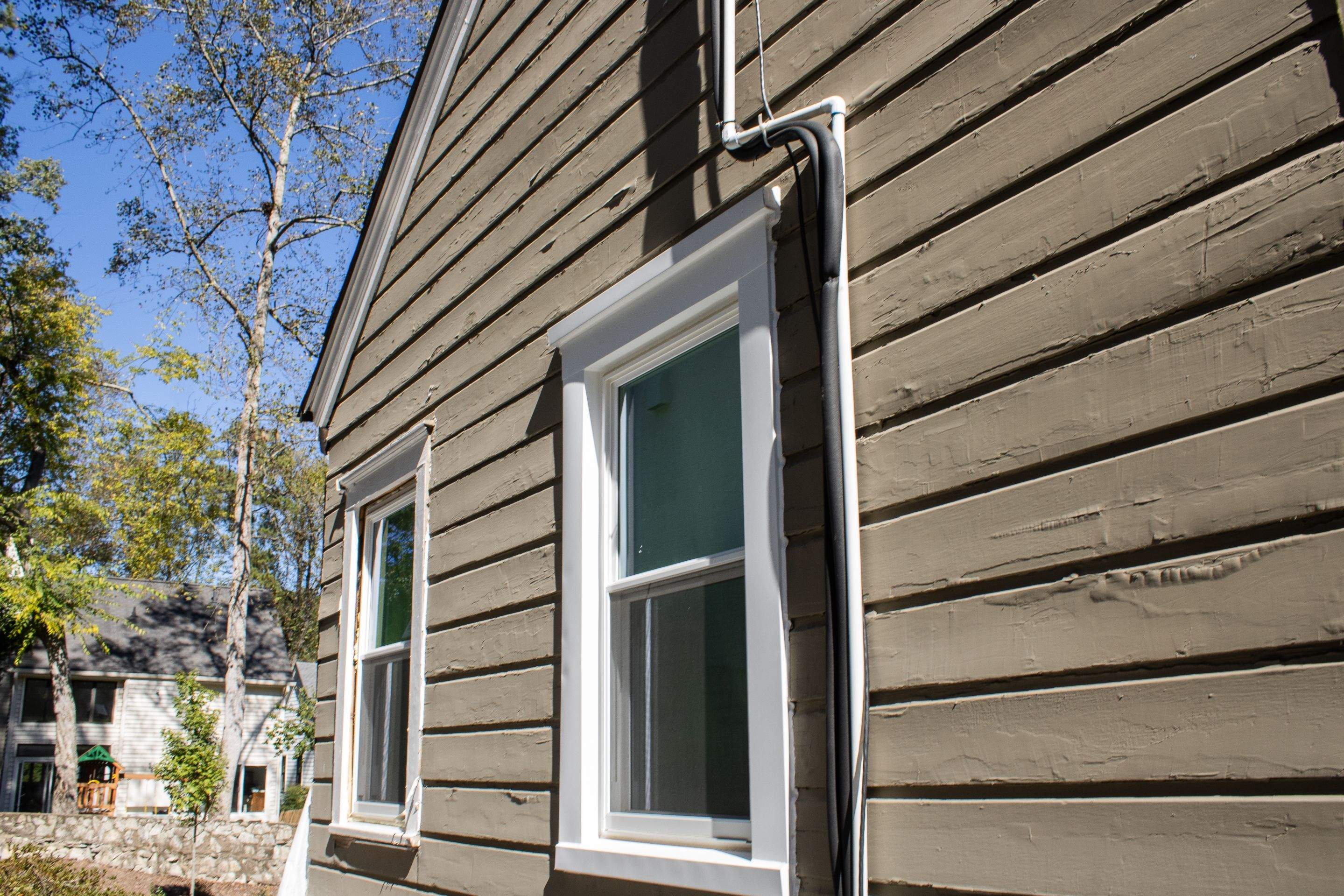 Full Siding Replacement, Deck Build, Exterior Paint, and Gutter Replacement  by Nelson Exteriors 