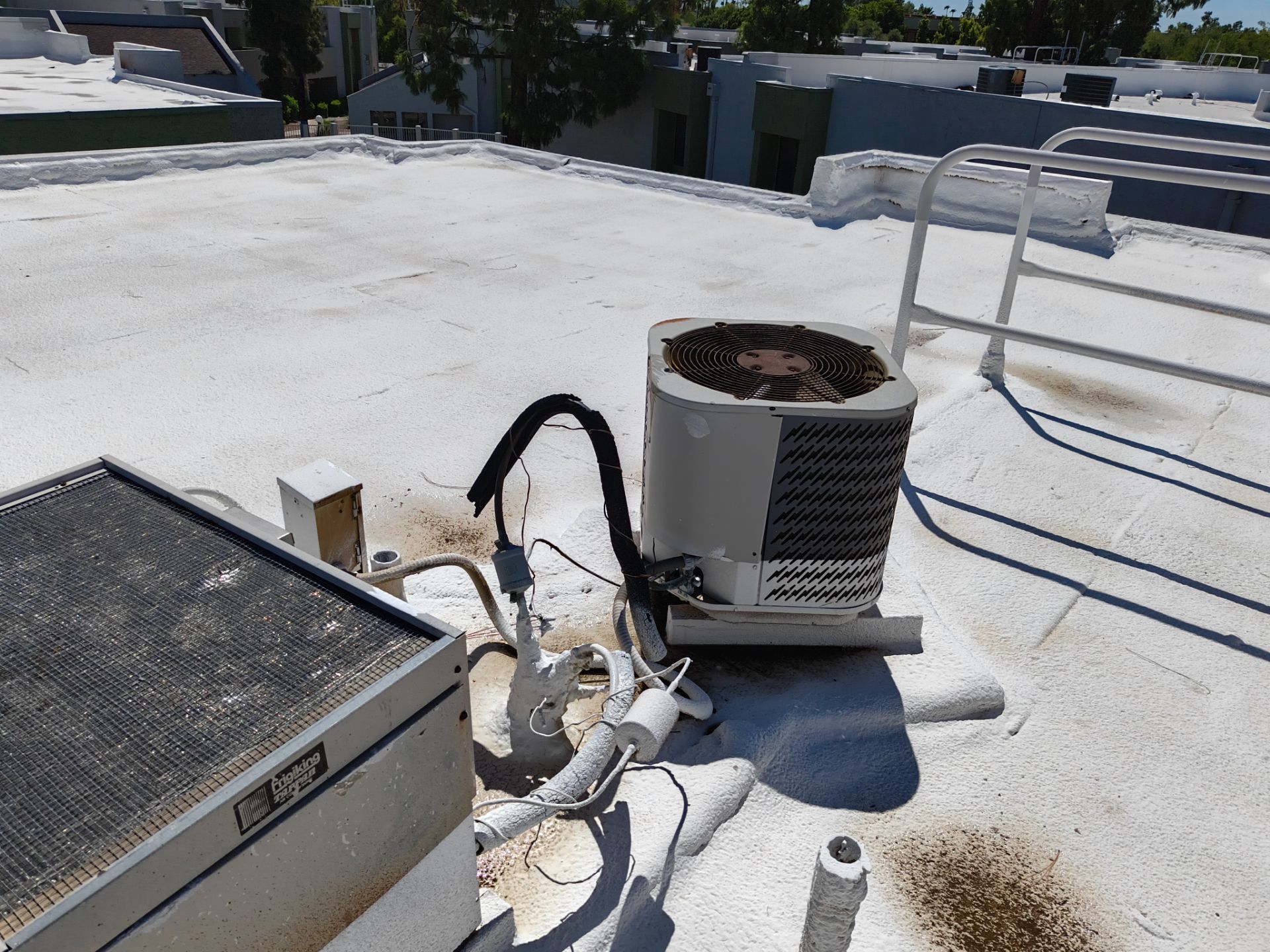 Mesa Apartment Flat Roof Coating and Interior Restoration Services by APM Builders LLC