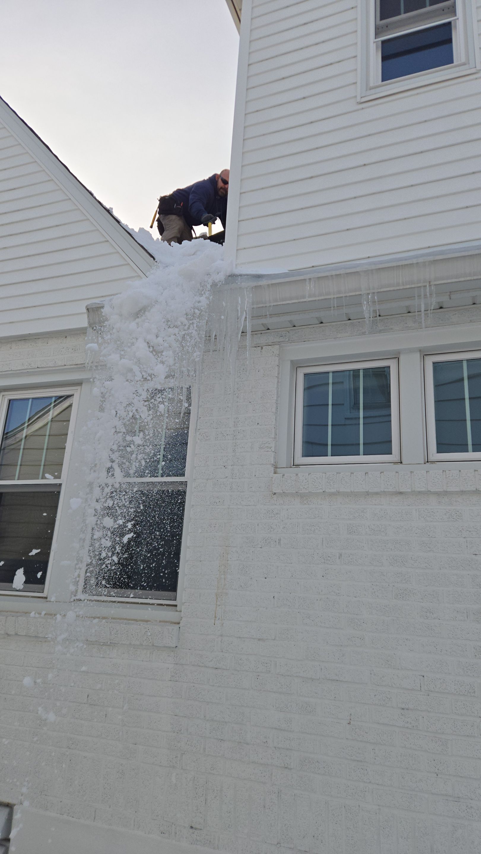 Massive Ice Dam Removal by Level Up Roofing and Restoration Services LLC