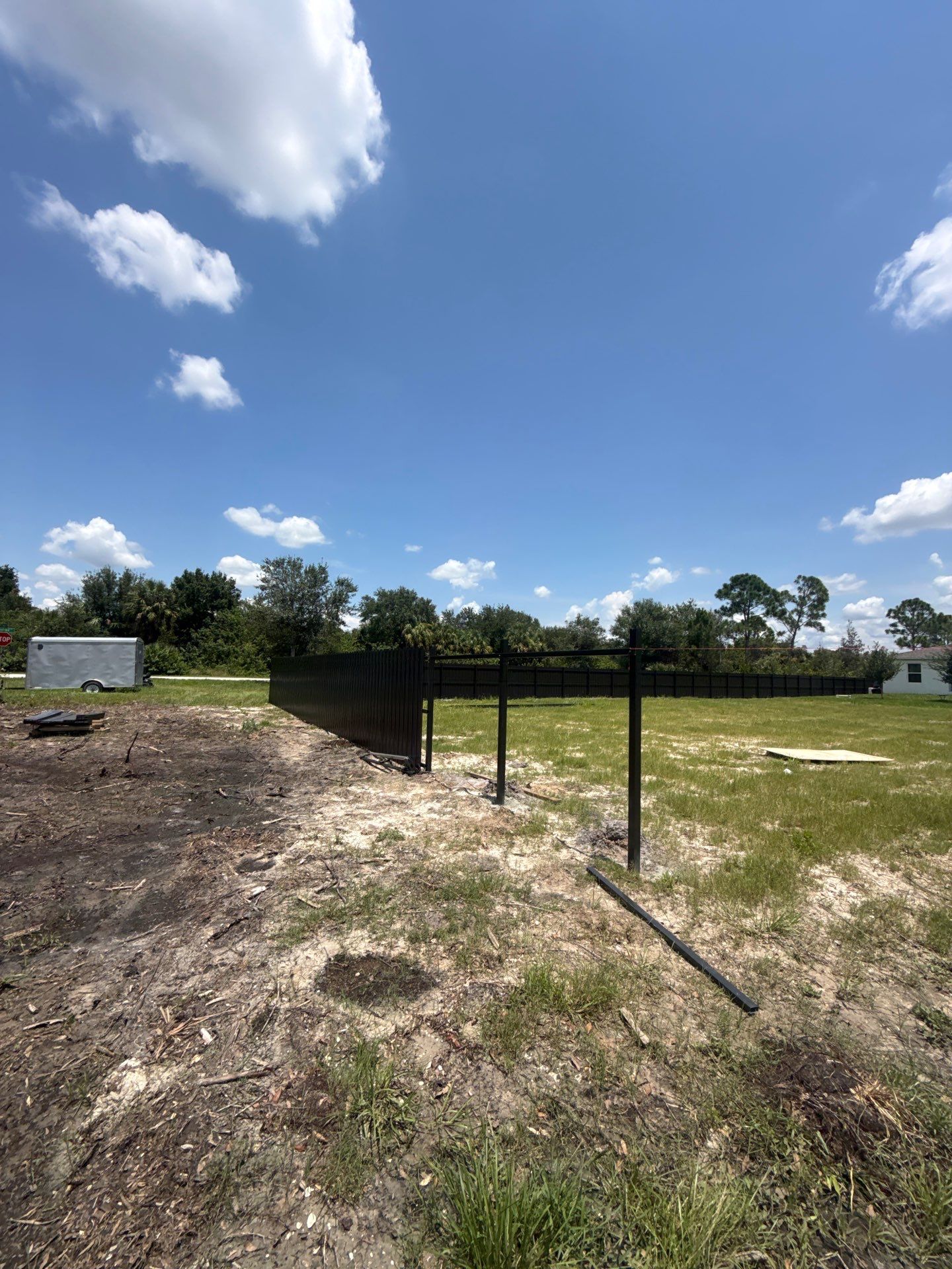 Black Scalloped Metal Privacy Fence Installation in Punta Gorda by True Fence LLC