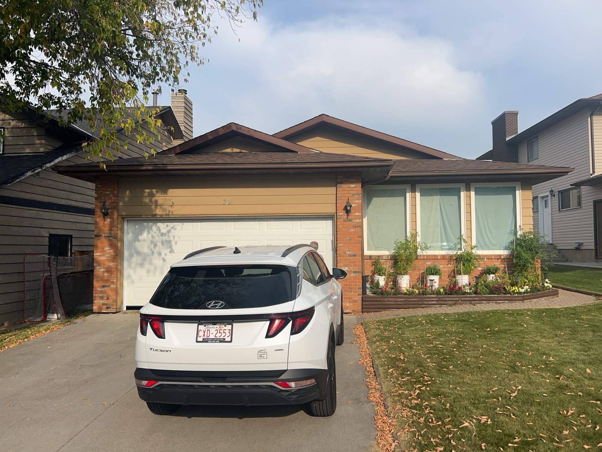 Calgary Chimney Chase Reconstruction and Exterior Siding Replacement by Smart Home Building Systems Ltd.