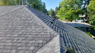 Residential Roofing Installation using Owens Corning Duration Shingles in Estate Gray.