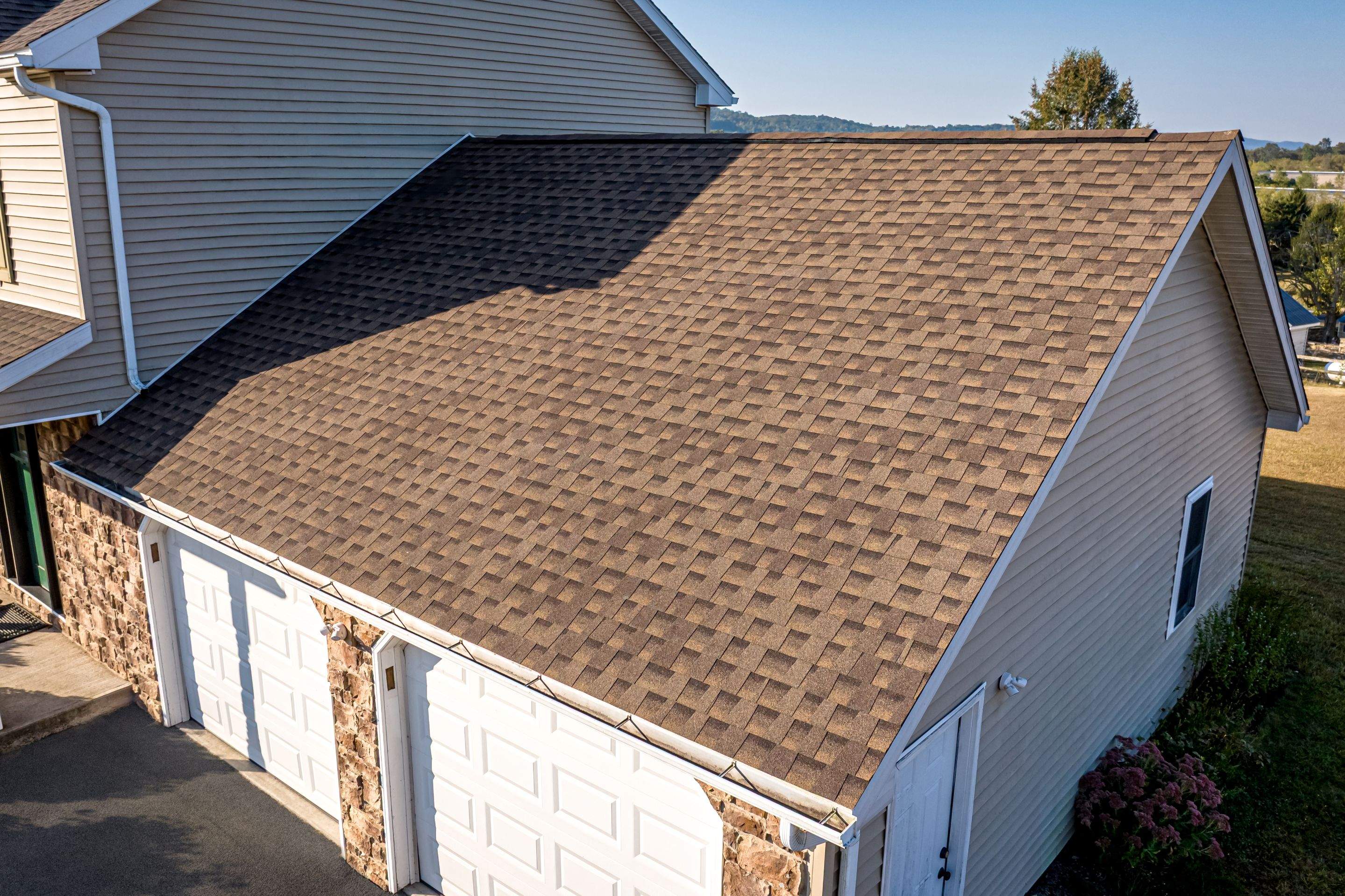 Reshingle and Entry Door by Esh Builders