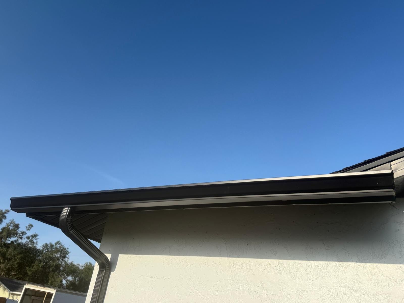 New Downspouts and Splash Guards in Sarasota FL by Gutter Professors
