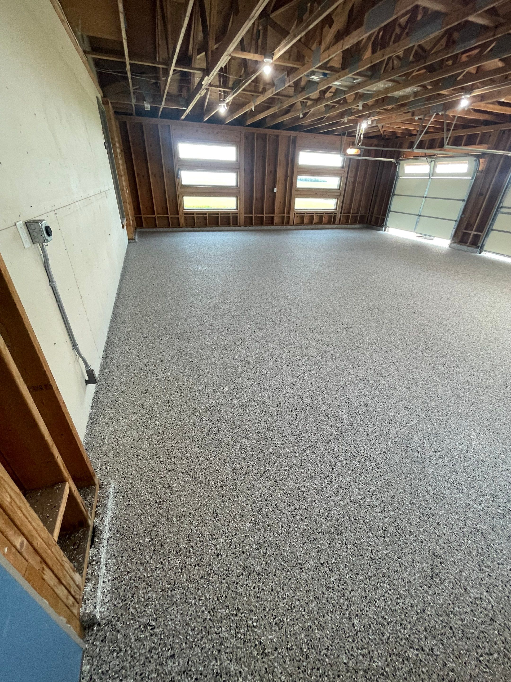 Cabin Fever Coating for Detached Garage in Dell Rapids by Select Painting, Coatings & Garage Cabinets