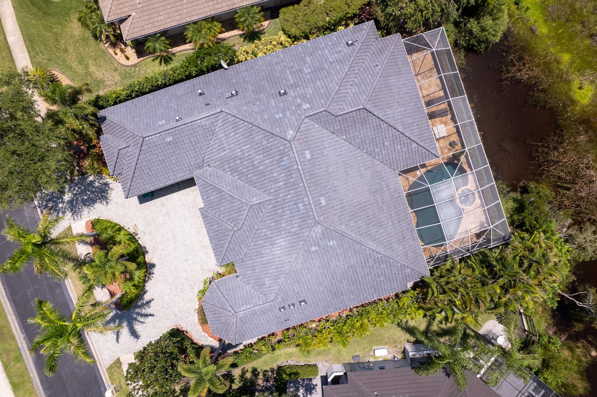 Residential Tile Roof Replacement with Skylight Integration in Melbourne by Wiedmann Construction & Roofing