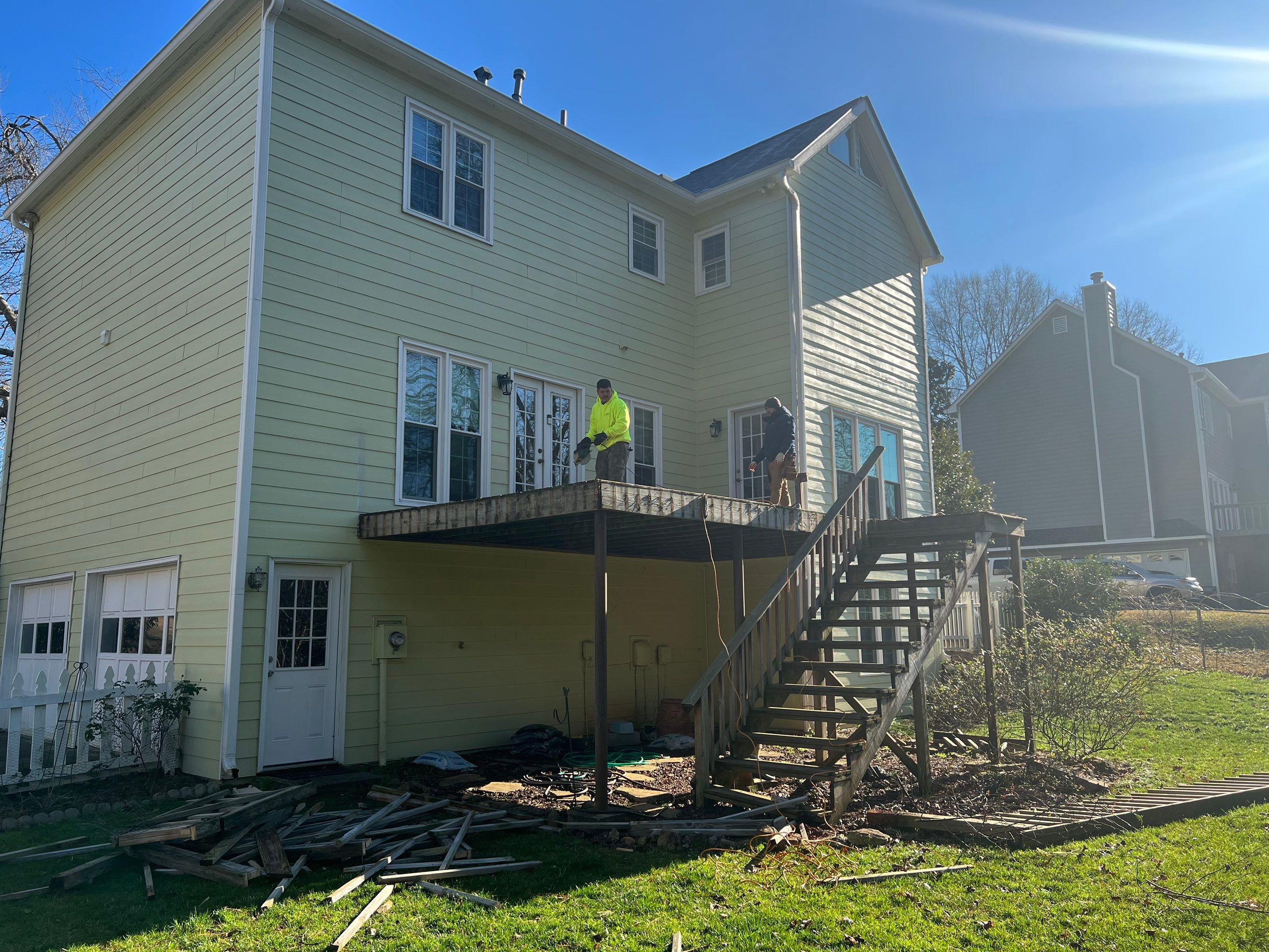 Elevated Grey Composite Deck Installation in Woodstock, Georgia by Swift Home Renovations