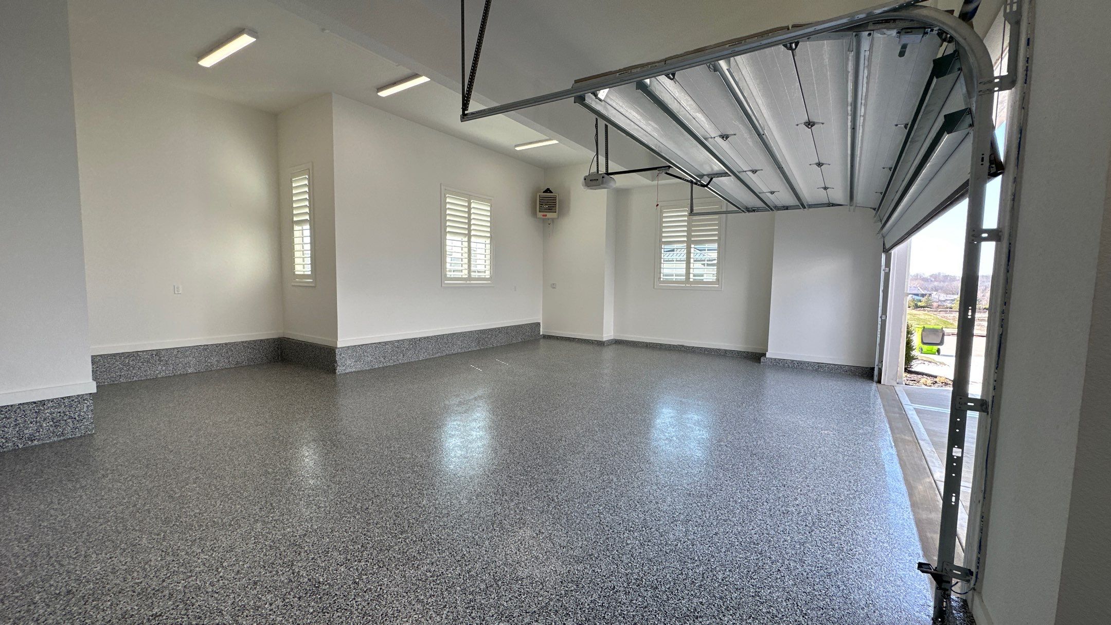 Mike & Pam transformed their garage with a Banner Garage Floor and Cabinets by Banner Garage