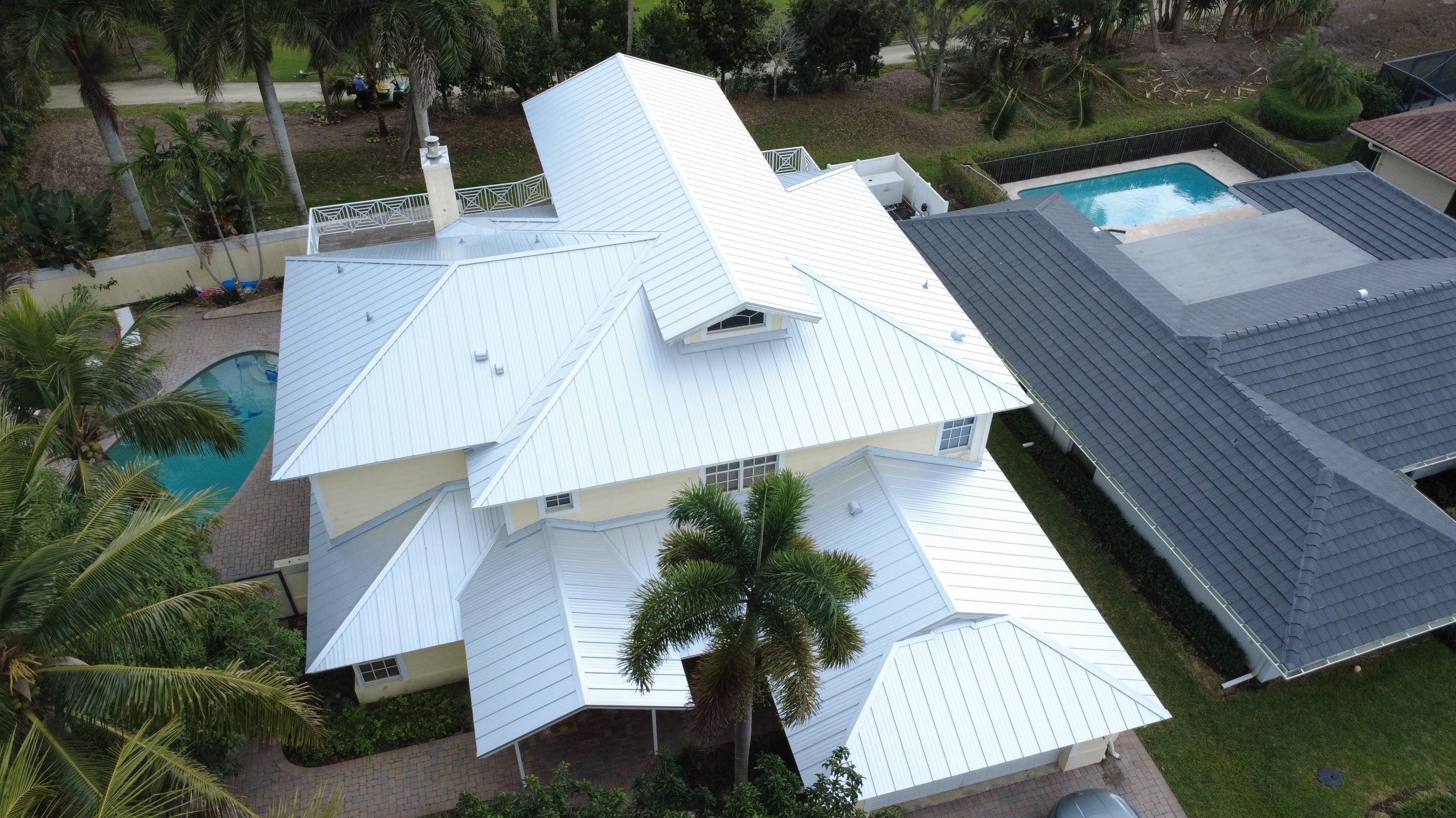 Residential Roofing Installation using 1" Nail strip metal roof by BLUES BROTHERS CONSTRUCTION CORP