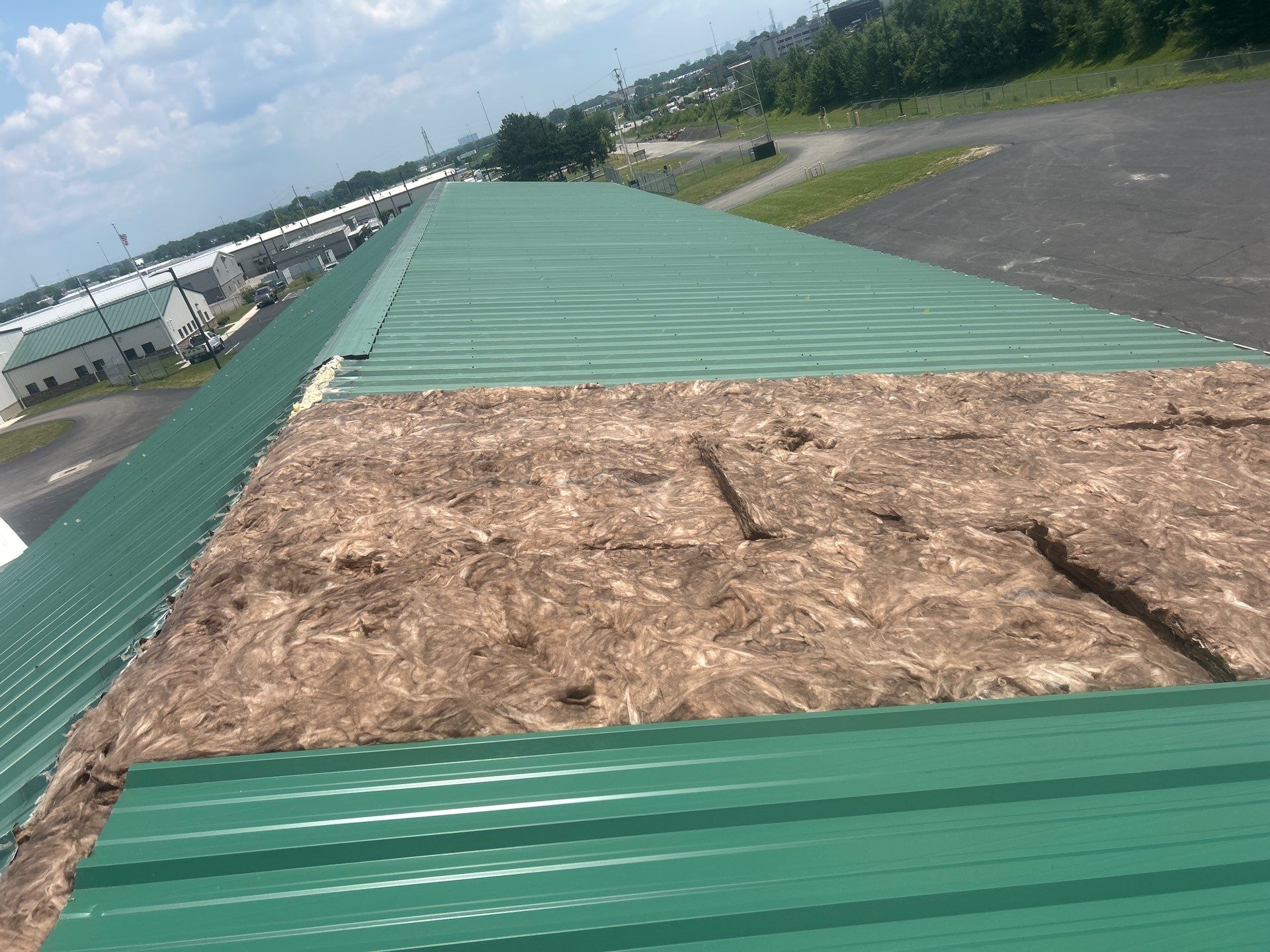 Commercial Roofing Repair using Ag panel green  by Nitro Roofing and Construction