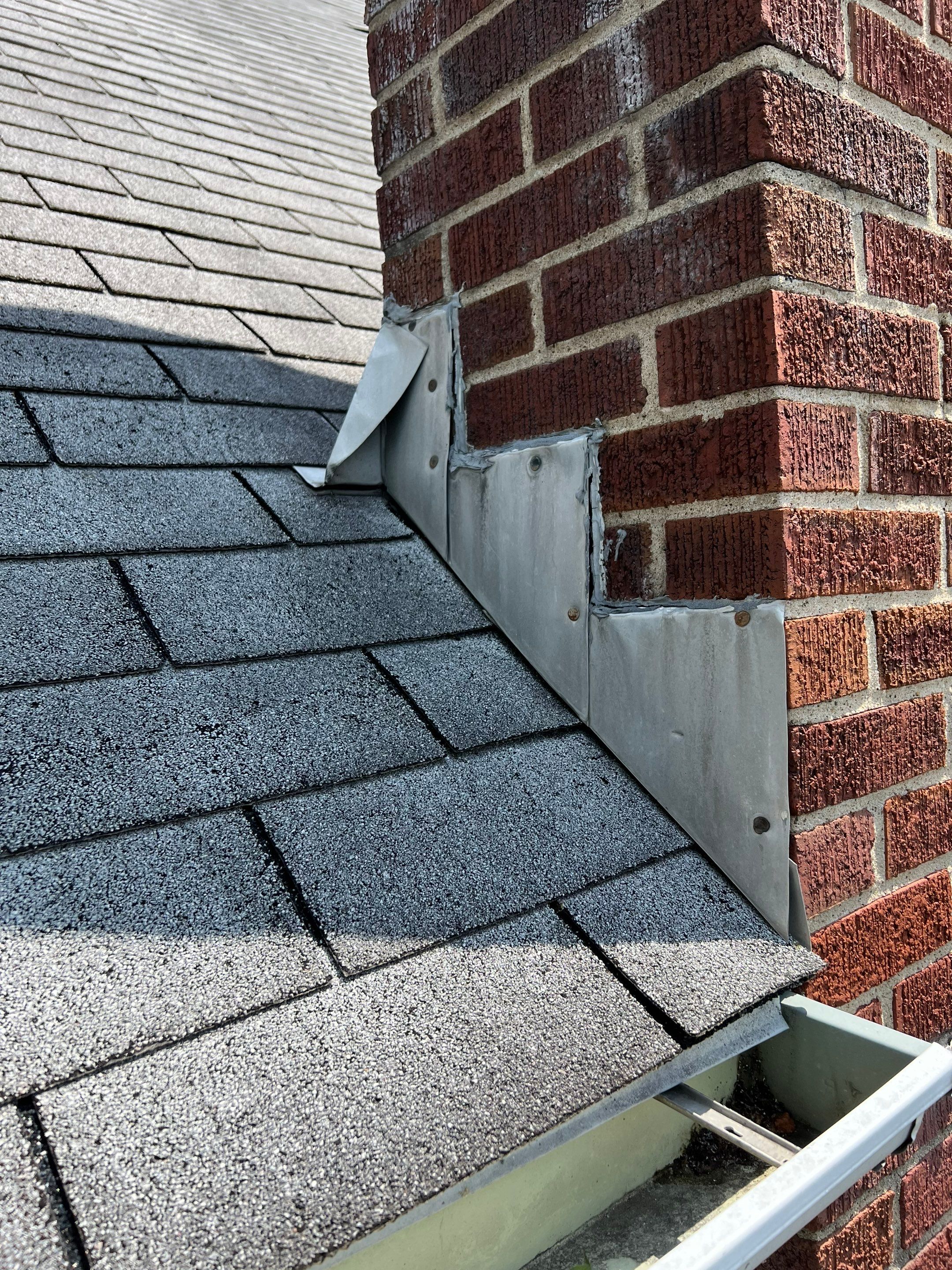 Residential Roofing Installation using Certainteed Landmark Shingles Moire Black Color by Secure Construction Company Inc