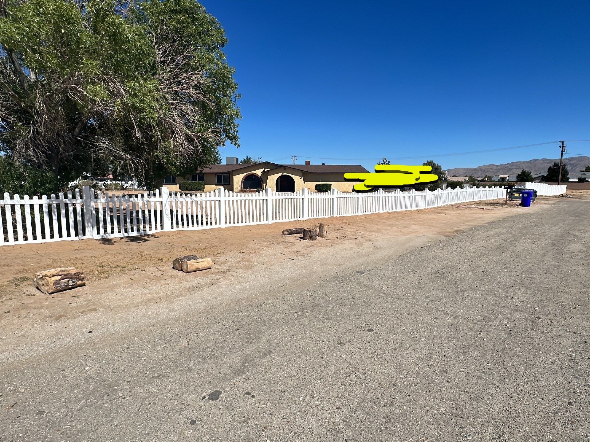 White picket fence  by Fence Guys Inc. 