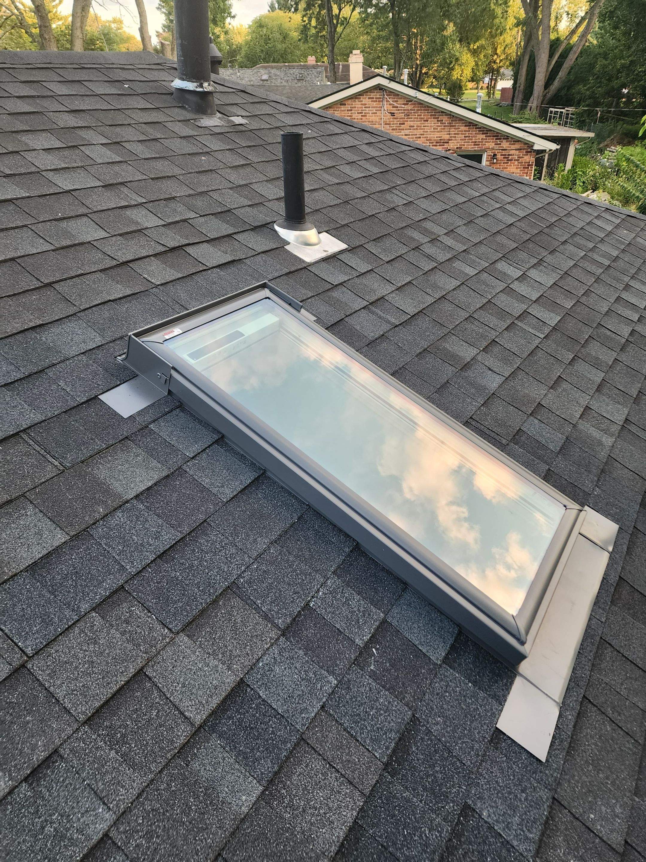 Dayton Skylight Replacement and Shingle Repair for Leaking Roof by Level Up Roofing and Restoration Services LLC