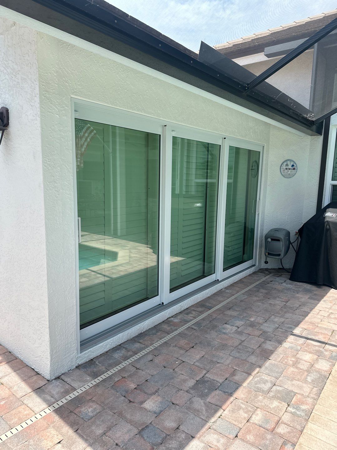 Window Installation using PGT Aluminum for the doors and PGT Vinyl for the Windows  by Windows For Life 