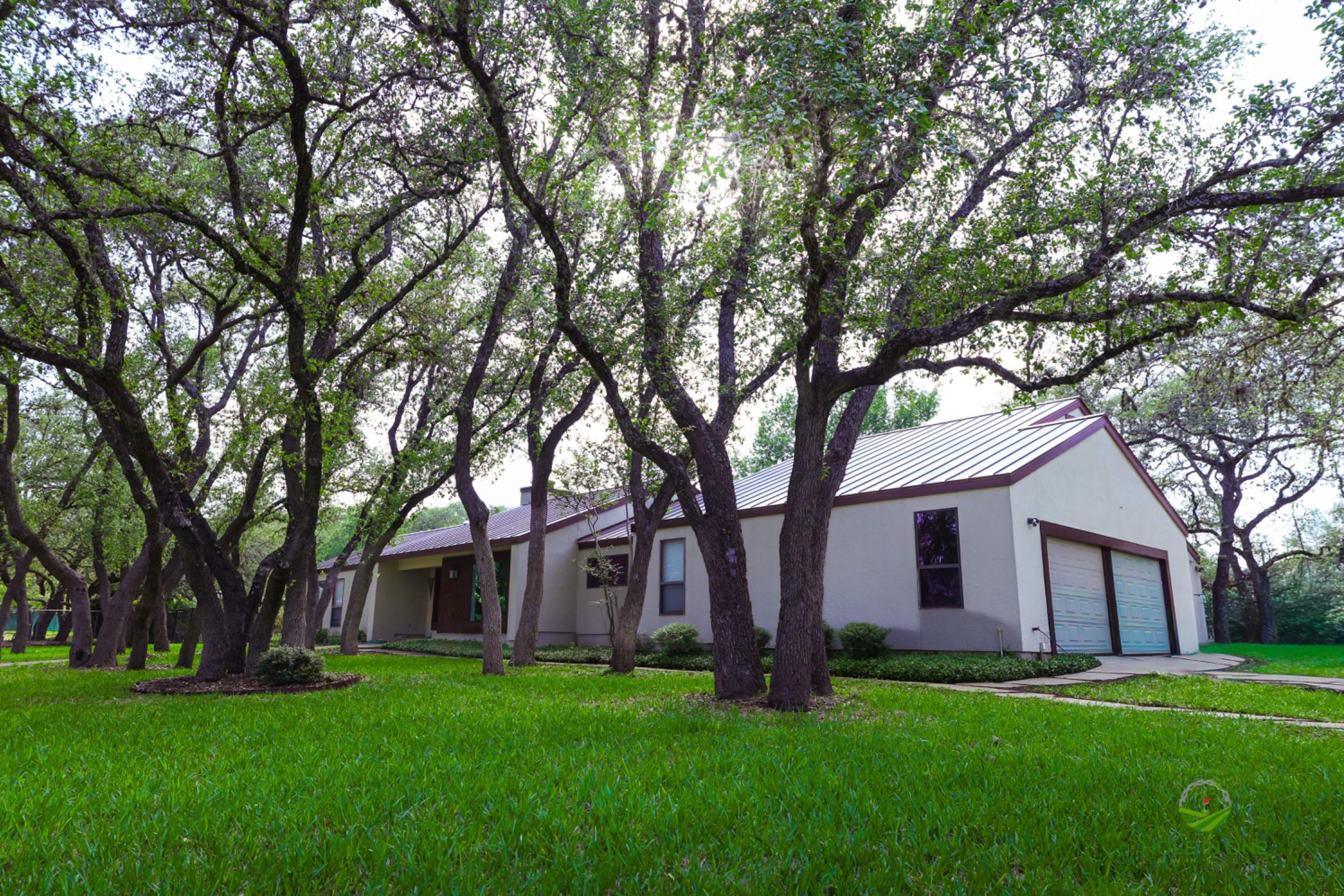 Scattered Oaks, San Antonio TX by Hole In One Lawns, LLC