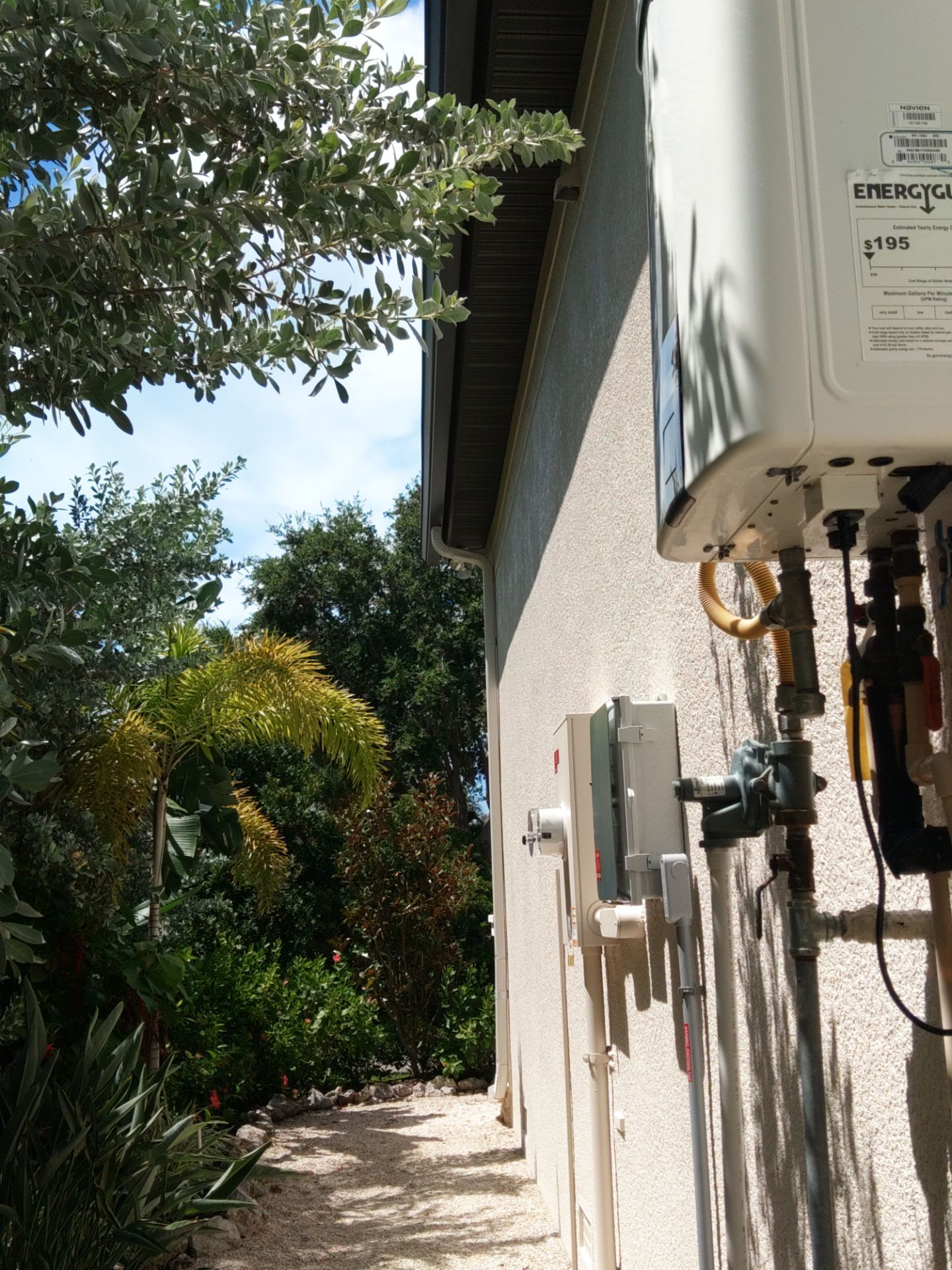 Bronze Gutters and Almond Downspouts in Longboat Key FL by Gutter Professors