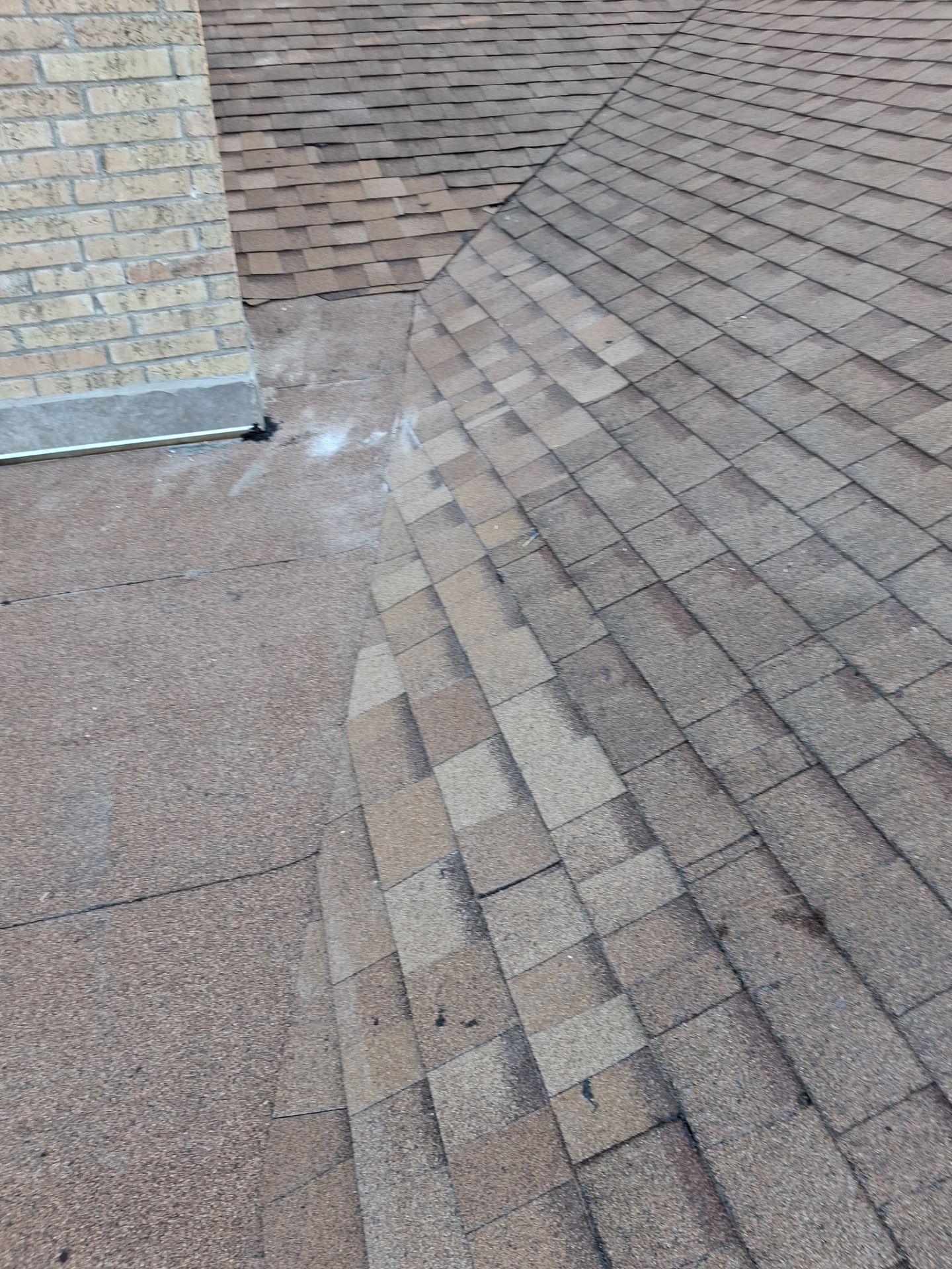 Chimneys need a Cricket.  by Bayfront Roofing and Construction