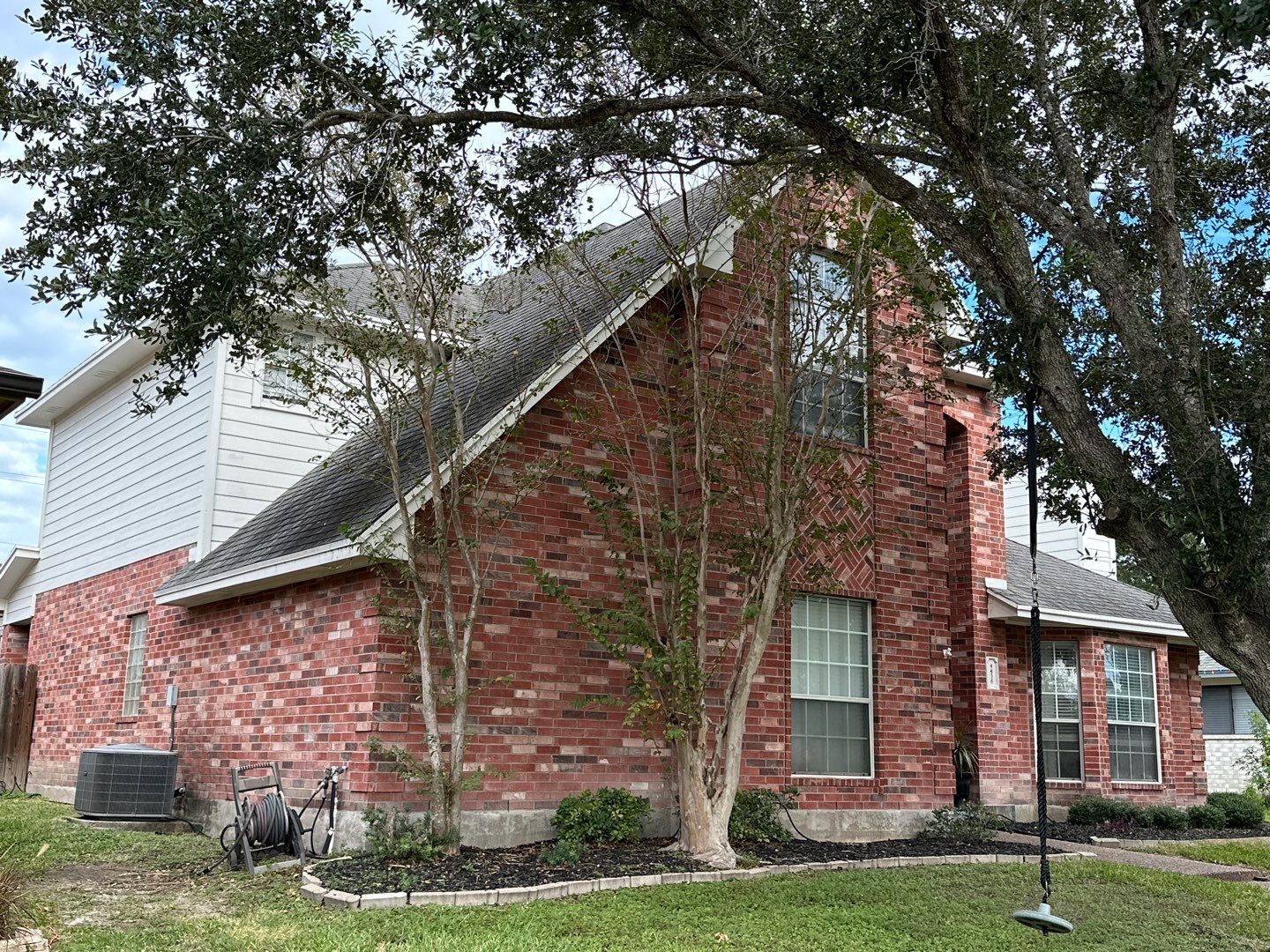 Residential Roofing Installation using Certainteed Landmark Moire Black by Galvan Roofing and Construction
