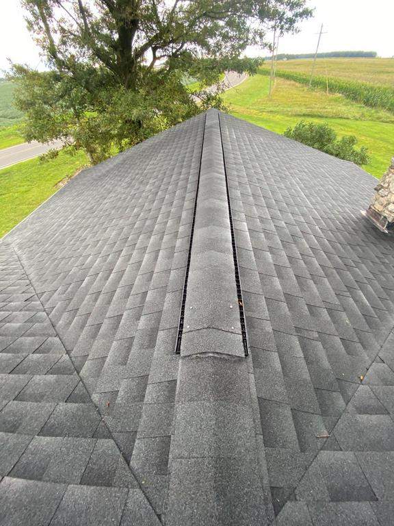 Storm damage roof replacement by Nitro Roofing and Construction