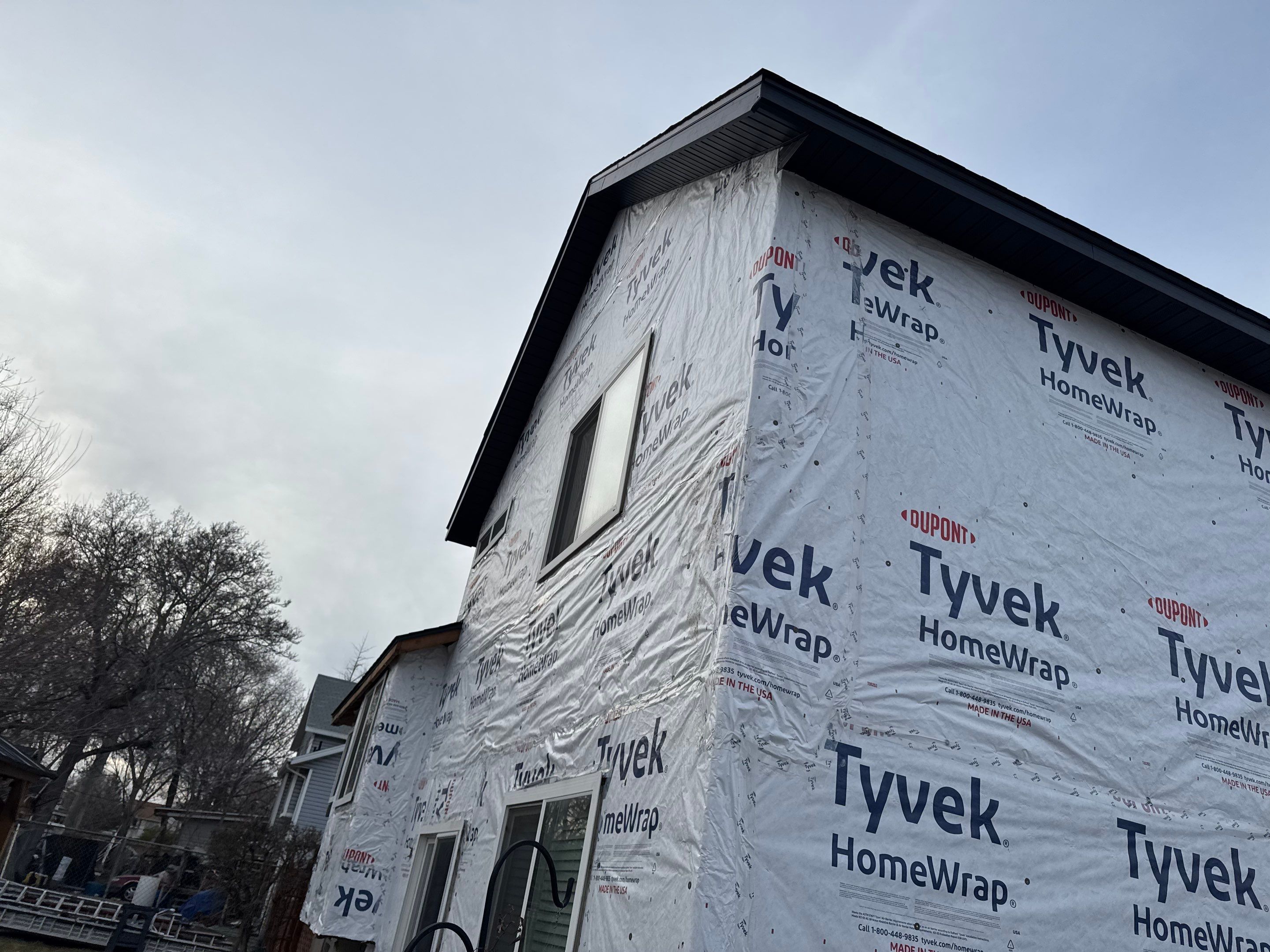 Salt Lake City | Premium Insulated Vinyl & Mixed Materials | Crisp White & Black by Ideal Siding Utah