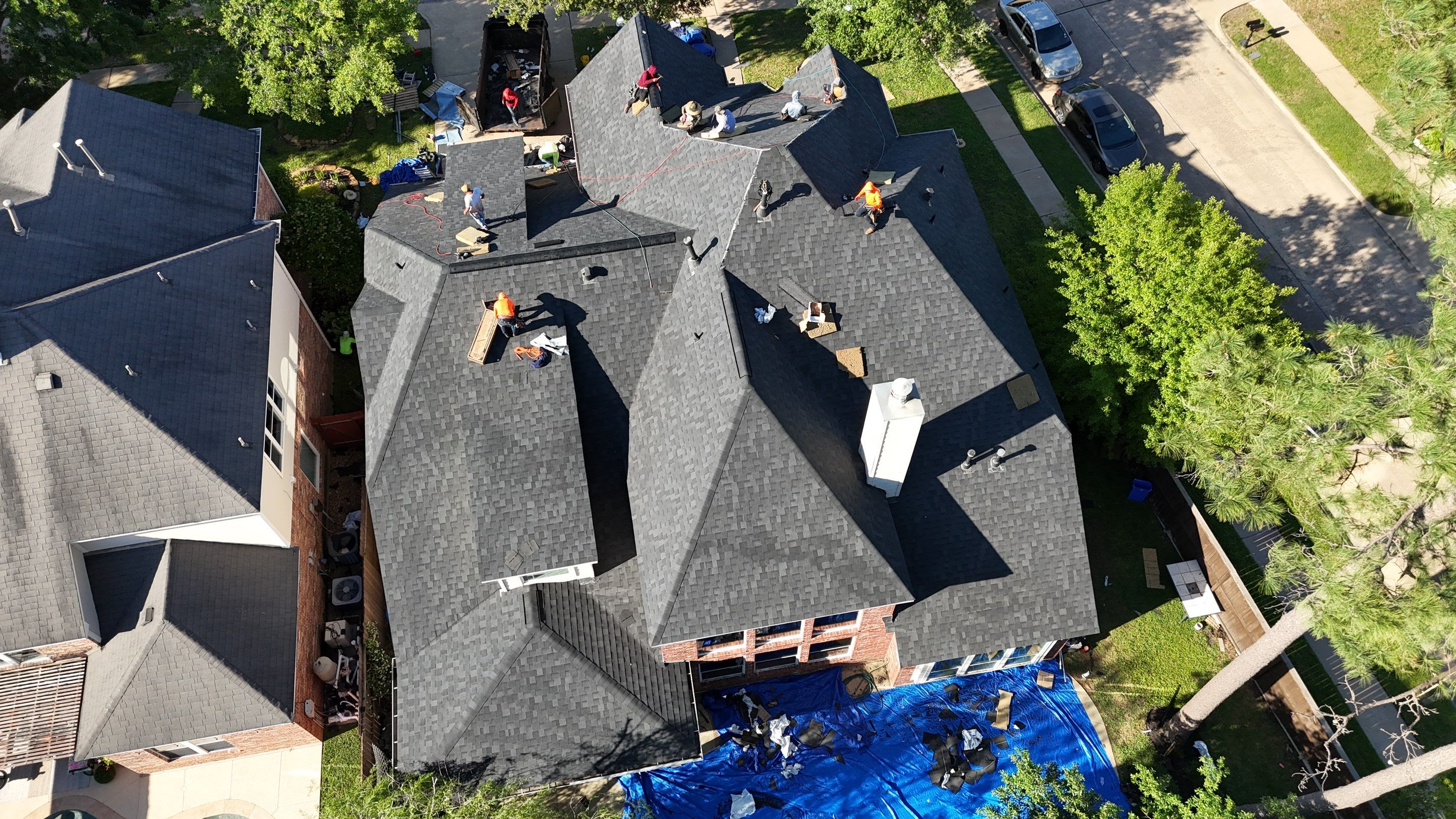 Residential Roofing Installation using Architectural Shingles by Core Four Roofing