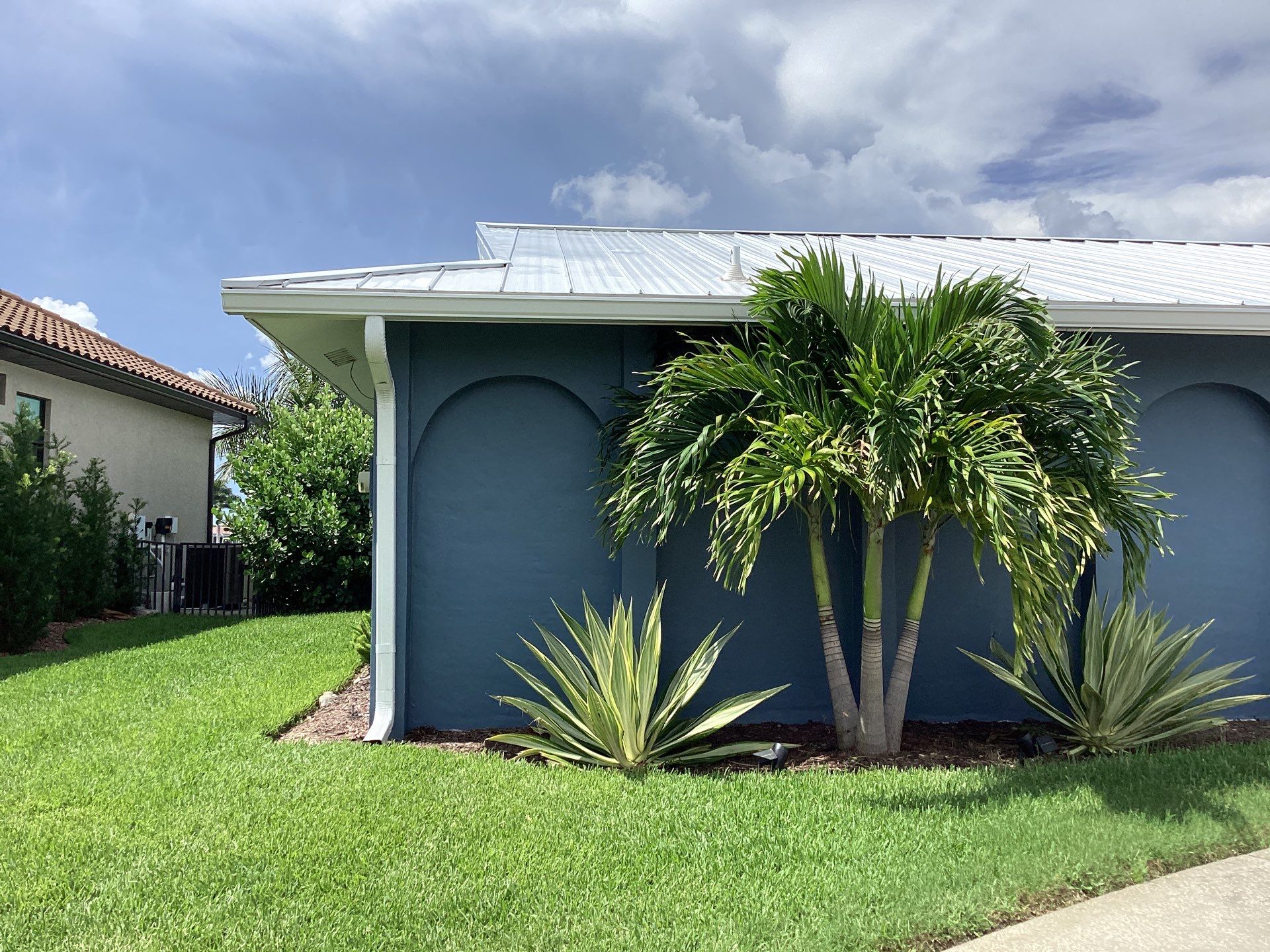 White Downspouts and Gutters Combo in Punta Gorda FL by Gutter Professors