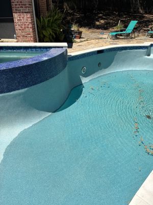 Freeform Pool Remodel with Raised Spa and New Tile