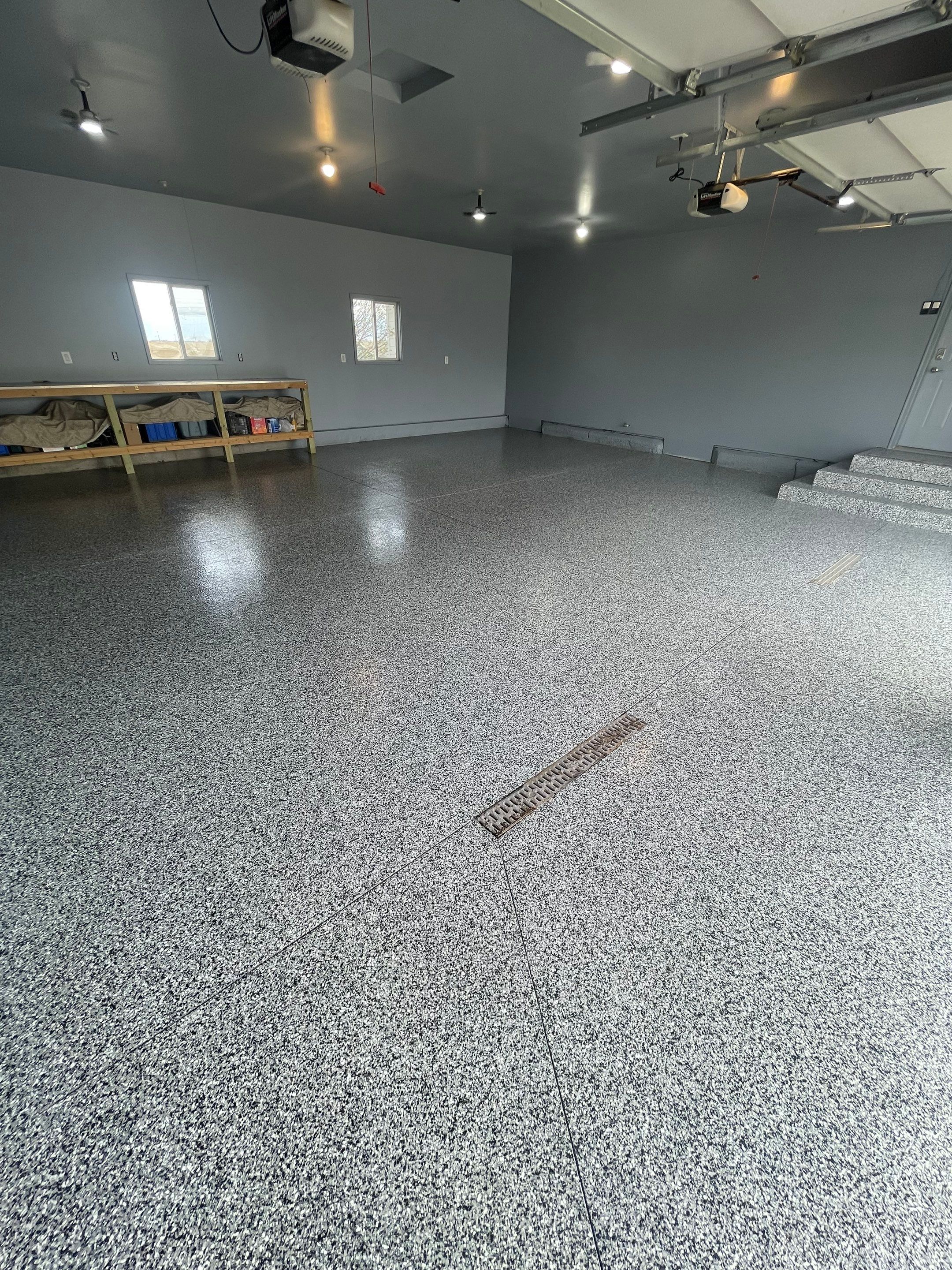 Grey Granite-Style Garage Floor Coating and Stairs in Hartford by Select Painting, Coatings & Garage Cabinets