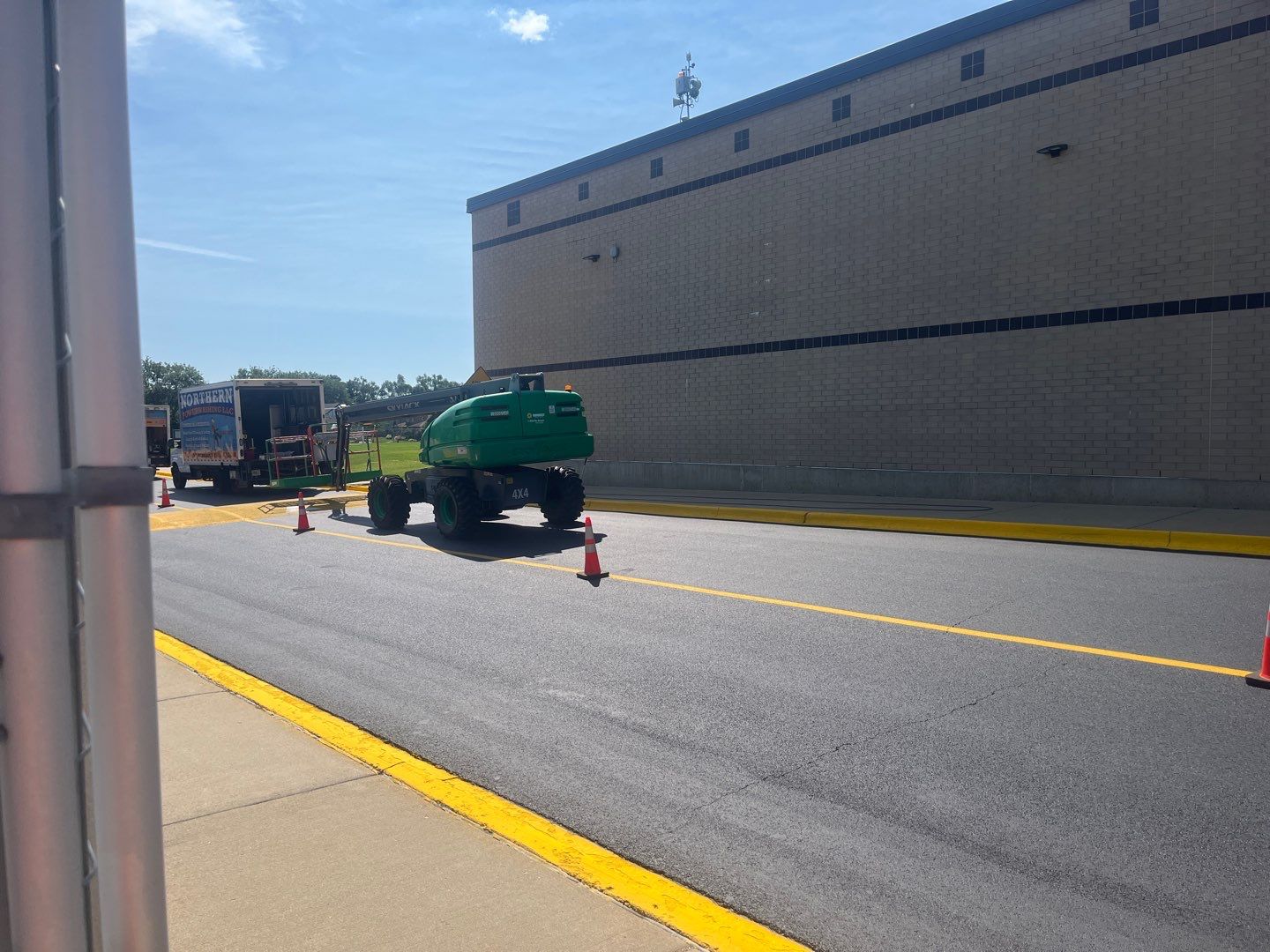 commercial pressure washing using Algaecide, soft wash soap by Northern Power Washing LLC.