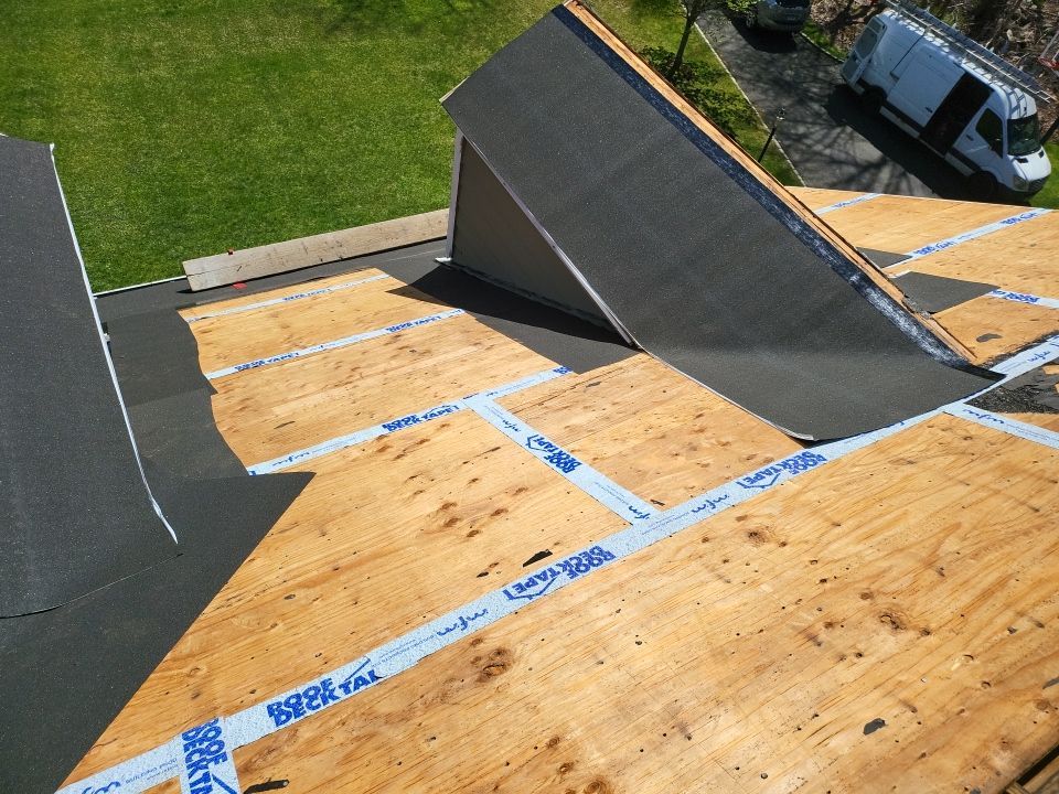 Residential Roofing Installation using onyx black by A Plus Exterior