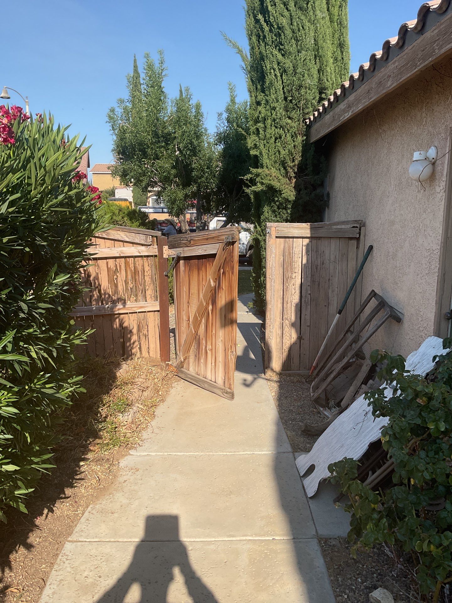 Gate installation using Vinyl by Fence Guys Inc. 