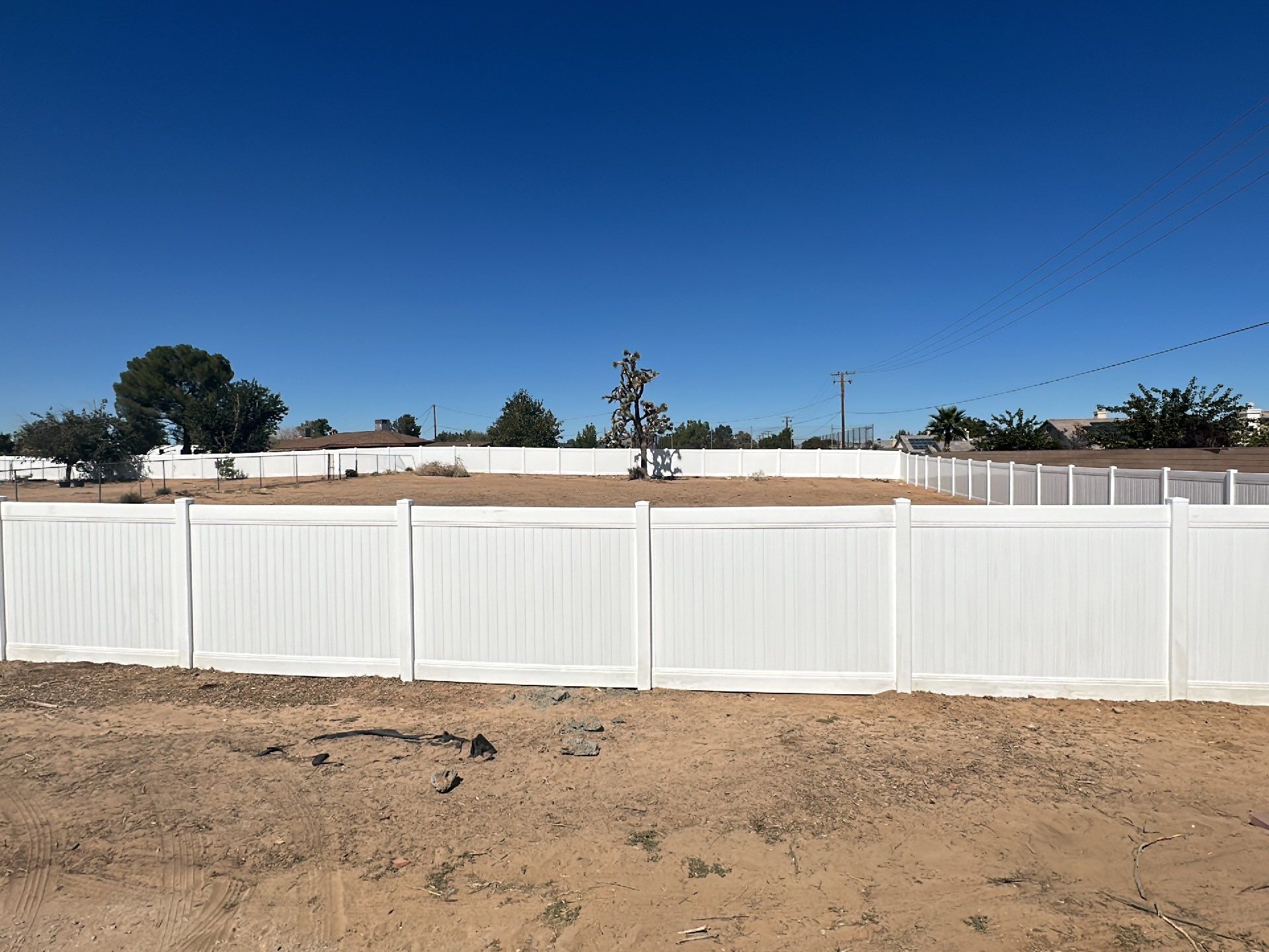 White picket fence  by Fence Guys Inc. 