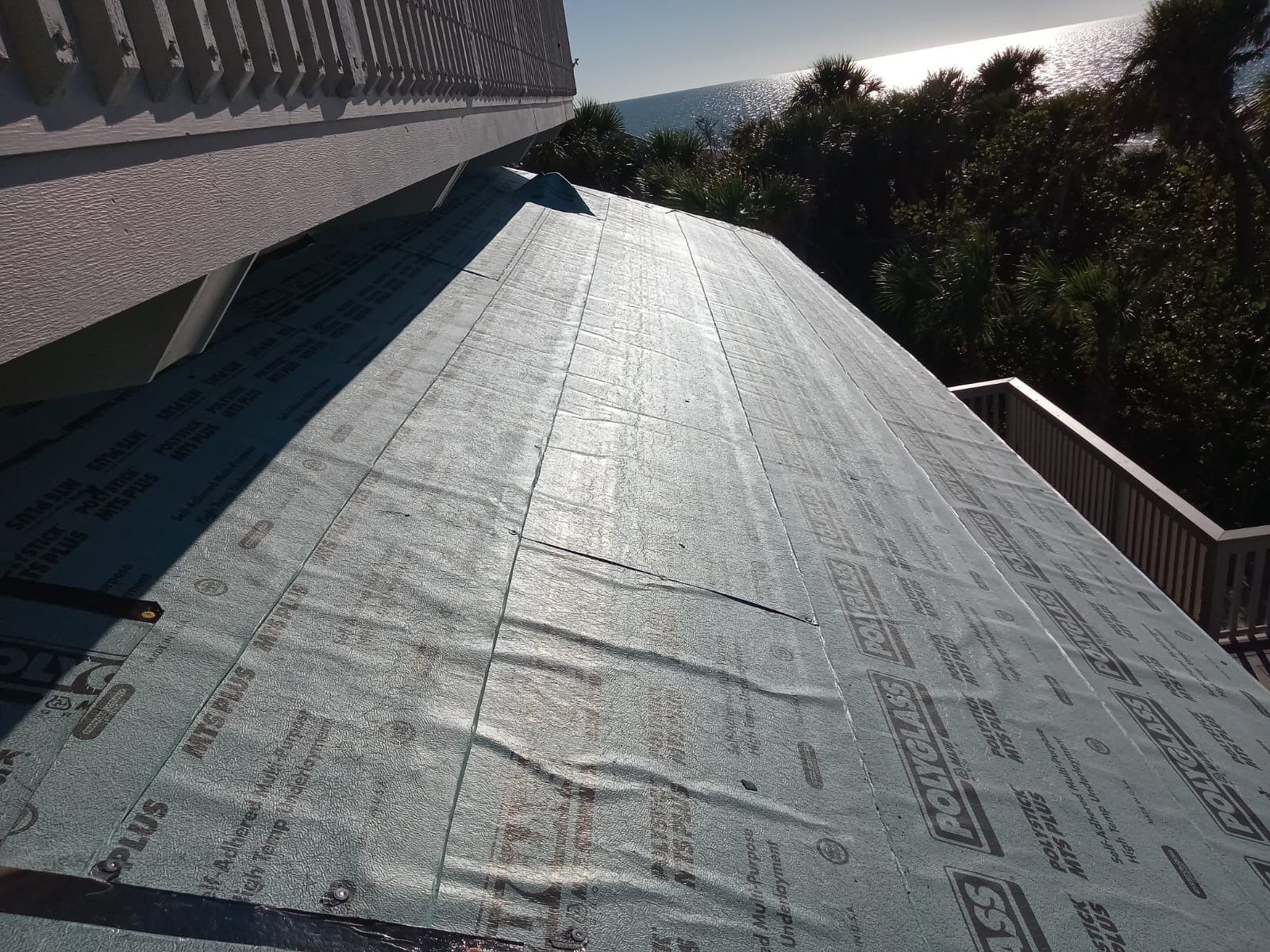 Residential Roofing Installation using Gulf Coast Metals Gulf Seam Panels by Four Peaks Roofing
