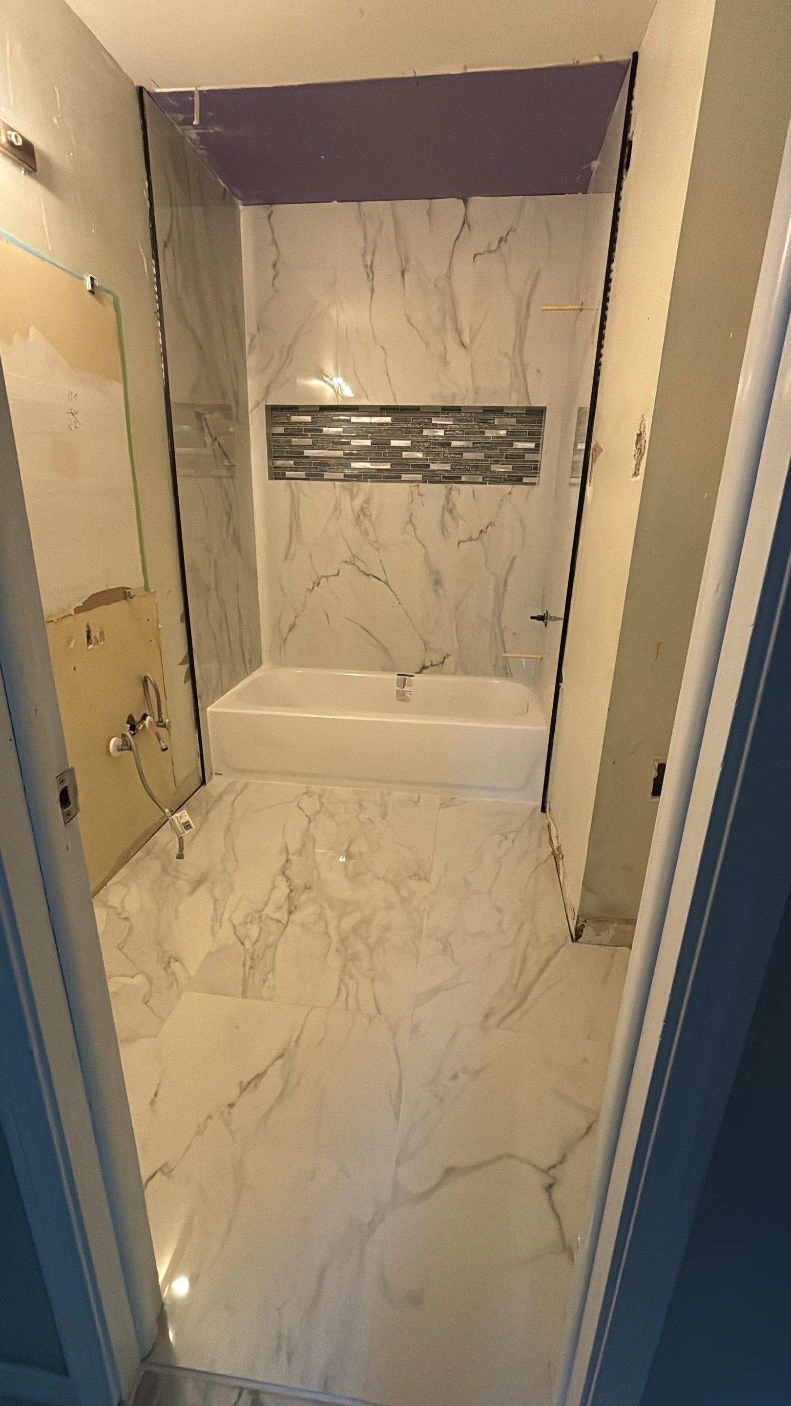 Master Bathroom, Children's Bathroom, and Fireplace Renovation by urban green energy llc