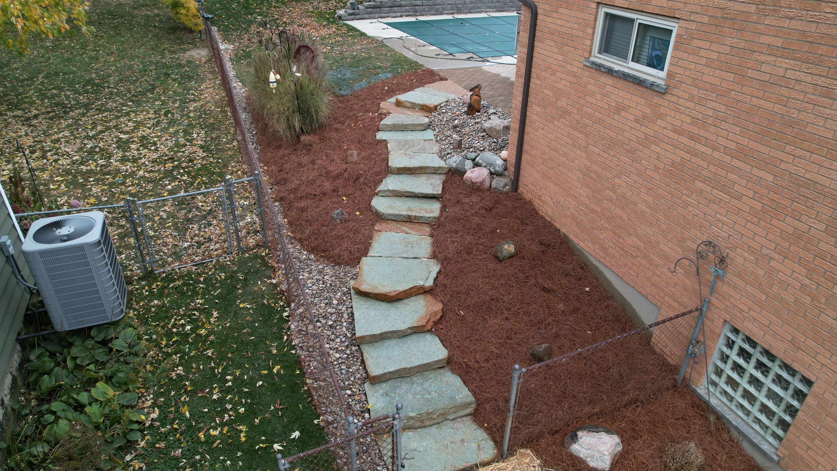 Rustic Buff Tread Stairway Installation by Reisenberg’s Lawn & Landscape, LLC