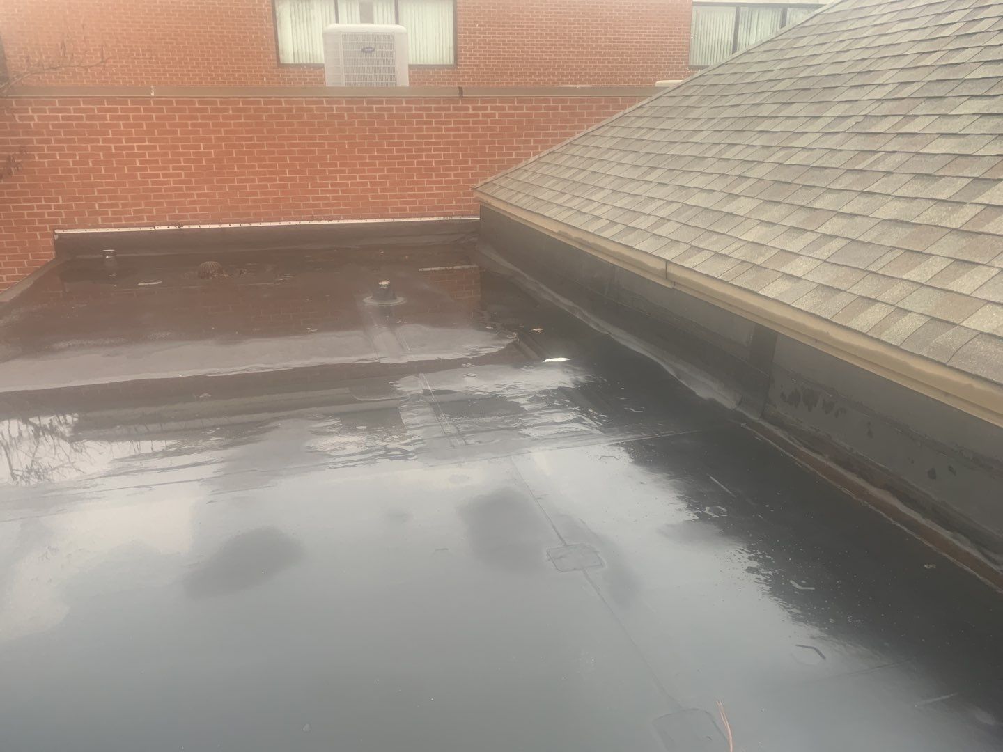 Re Roof (TPO) by American Roofing NC