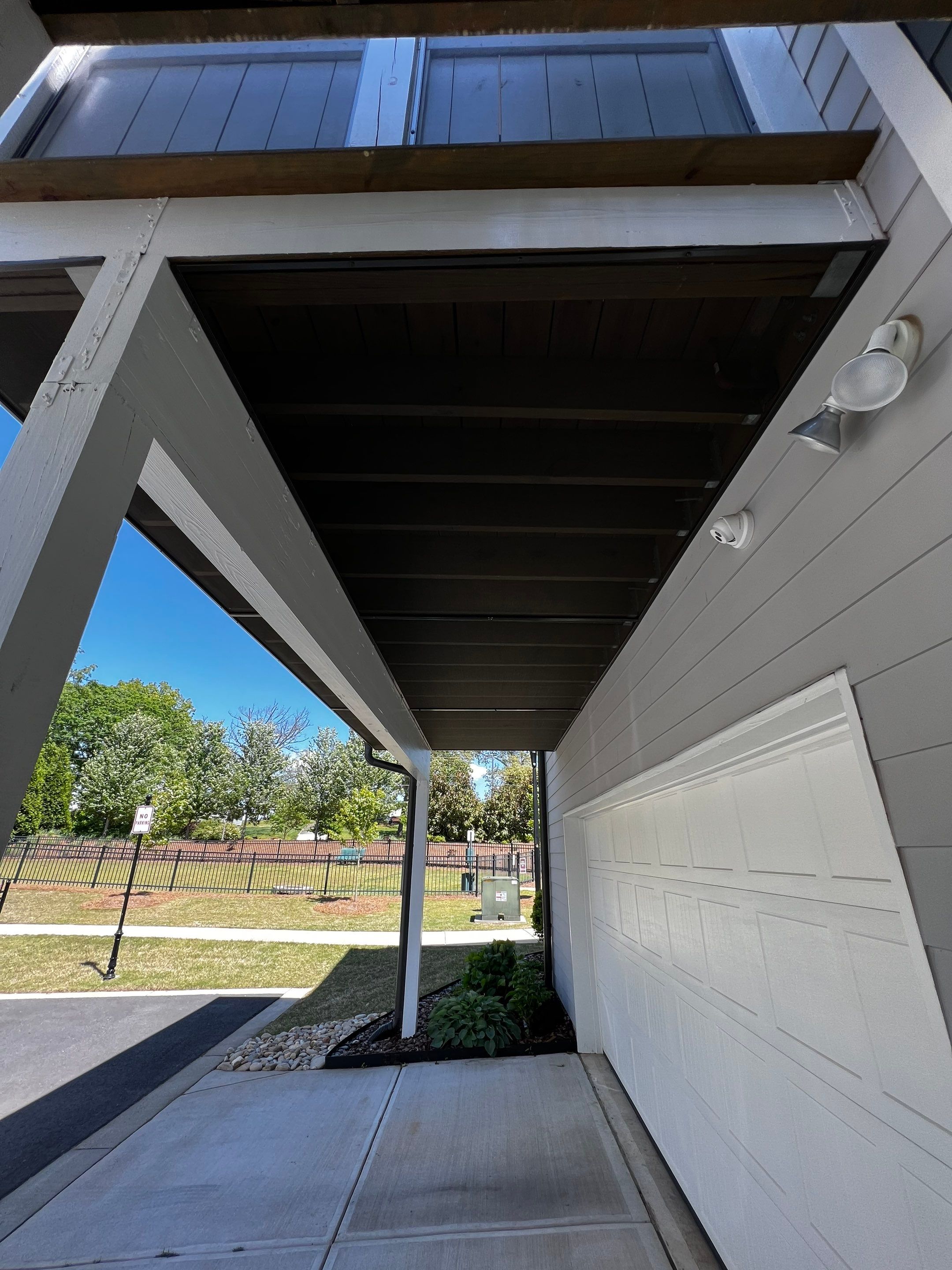 Custom Screened-in Porch Addition Above Garage in Woodstock by Swift Home Renovations