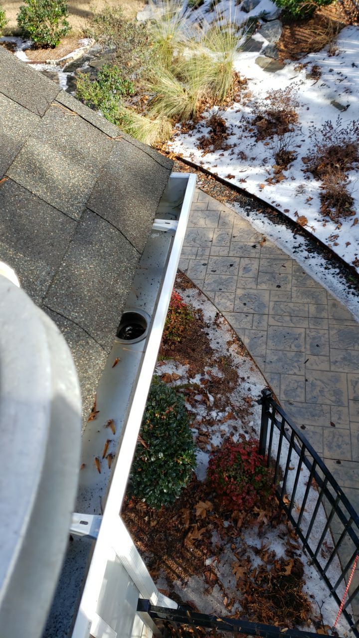 Gutter Cleaning using water by Power Wash Masters LLC