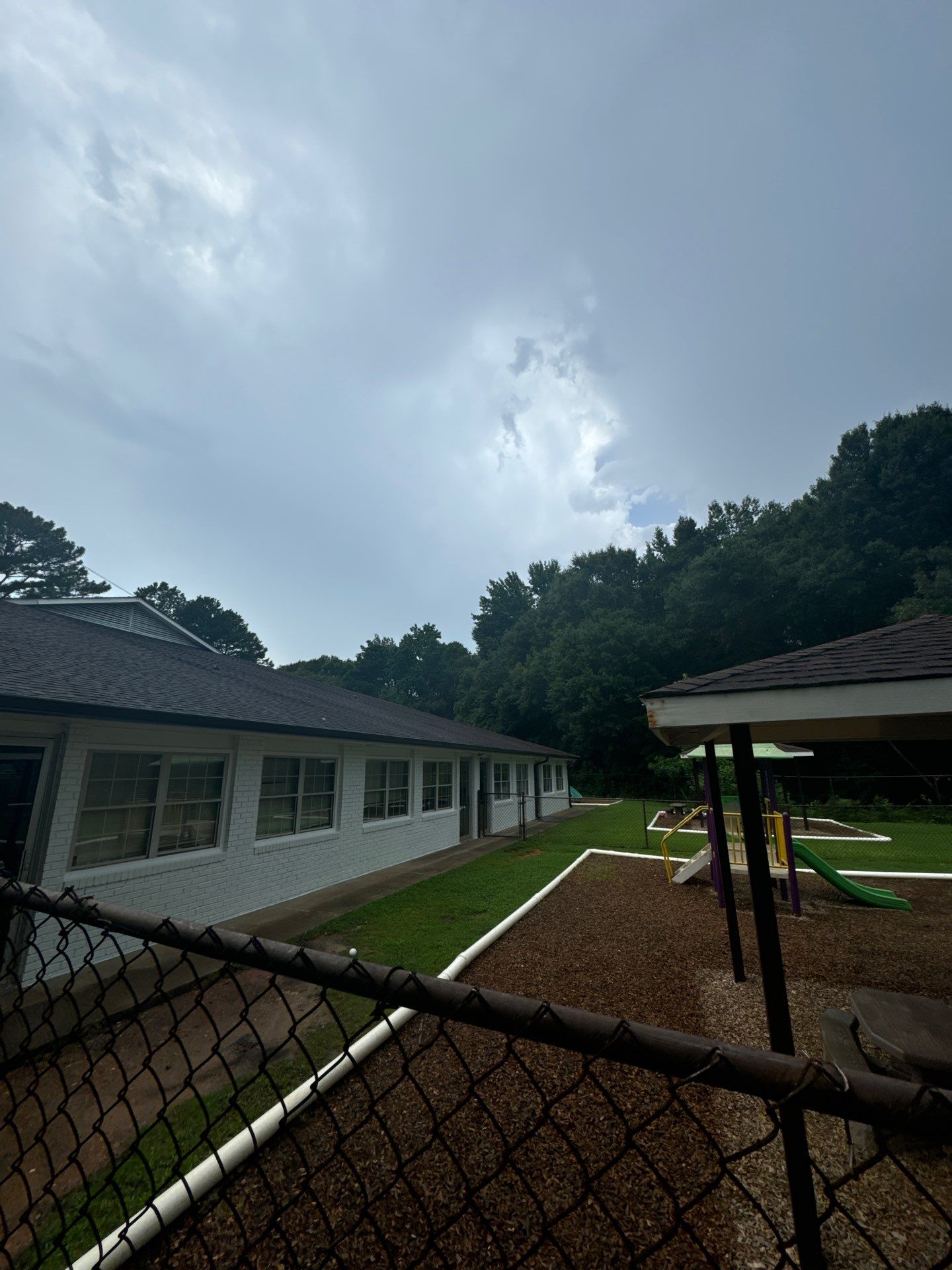 Commercial Exterior Brick and Stucco Painting in Fayetteville by Swift Home Renovations