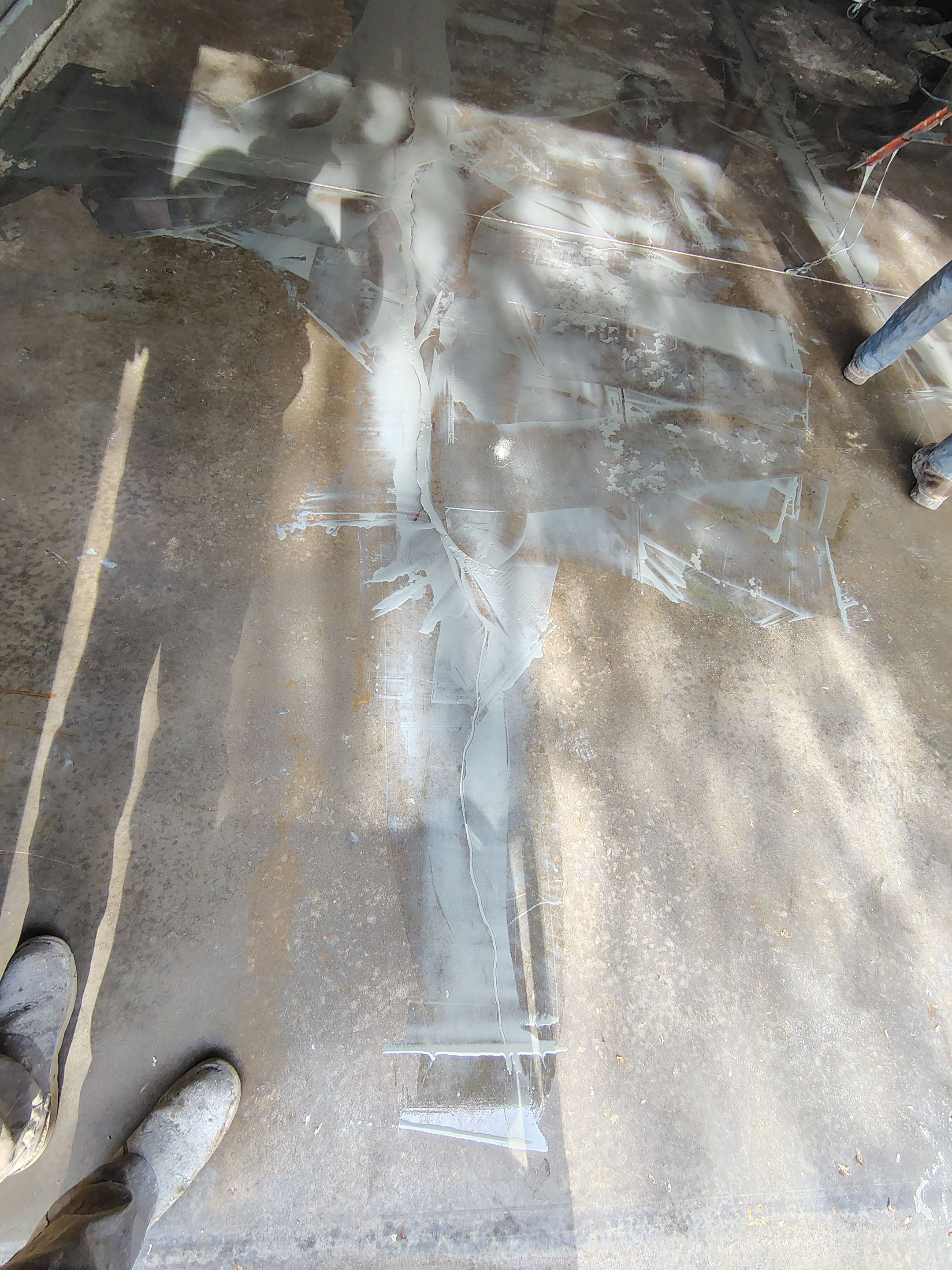 Garage Floor Concrete Coating and Crack Repair in Sioux Falls by Select Painting, Coatings & Garage Cabinets