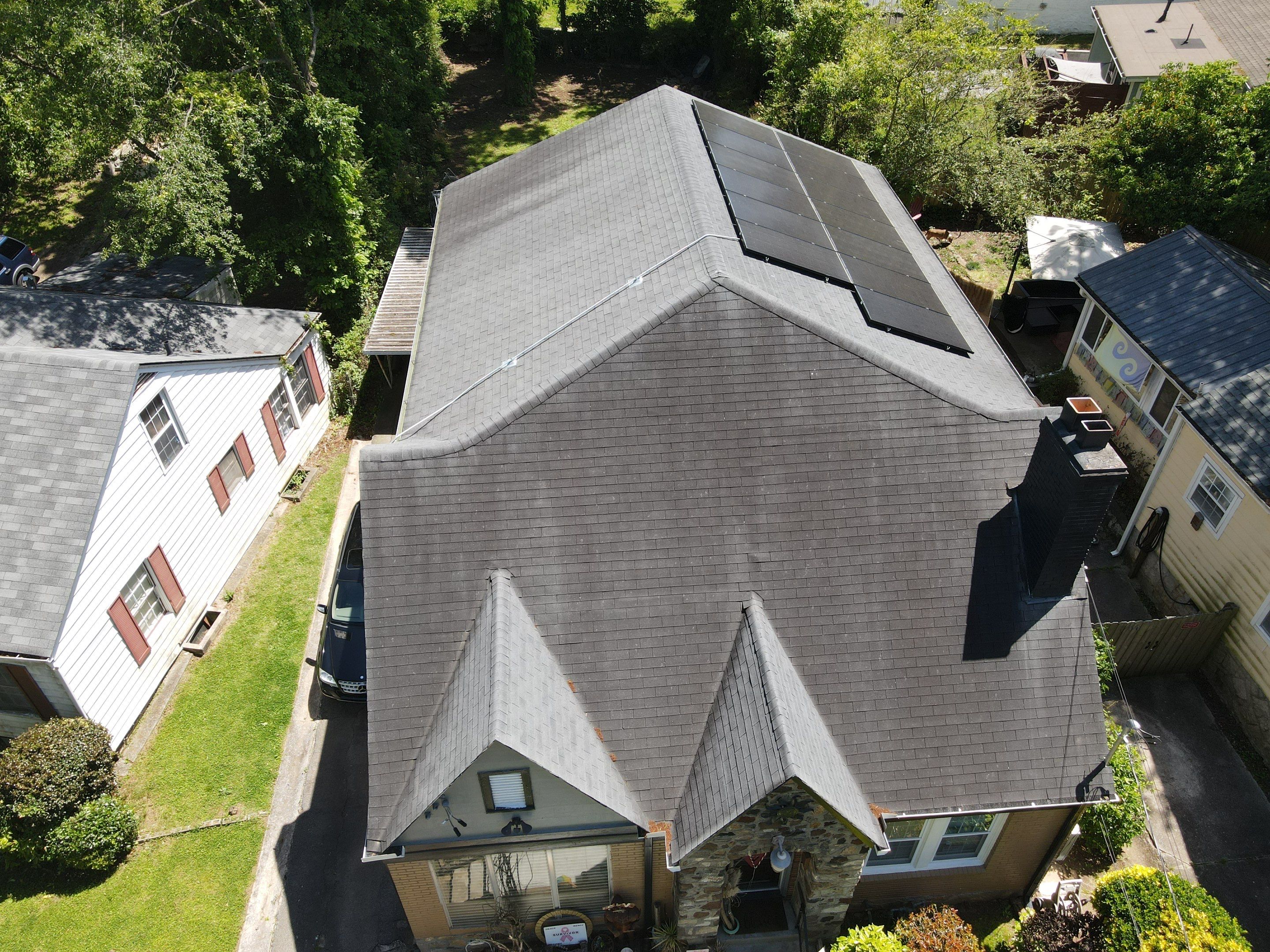 Residential Roof Replacement using Owens Corning Trudef Twilight Black by Inspector Roofing and Restoration