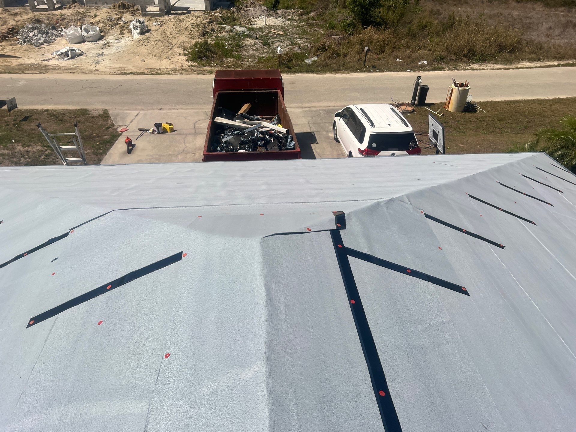 Residential Roofing Installation using Tuff Rib by Durabilis Roofing INC