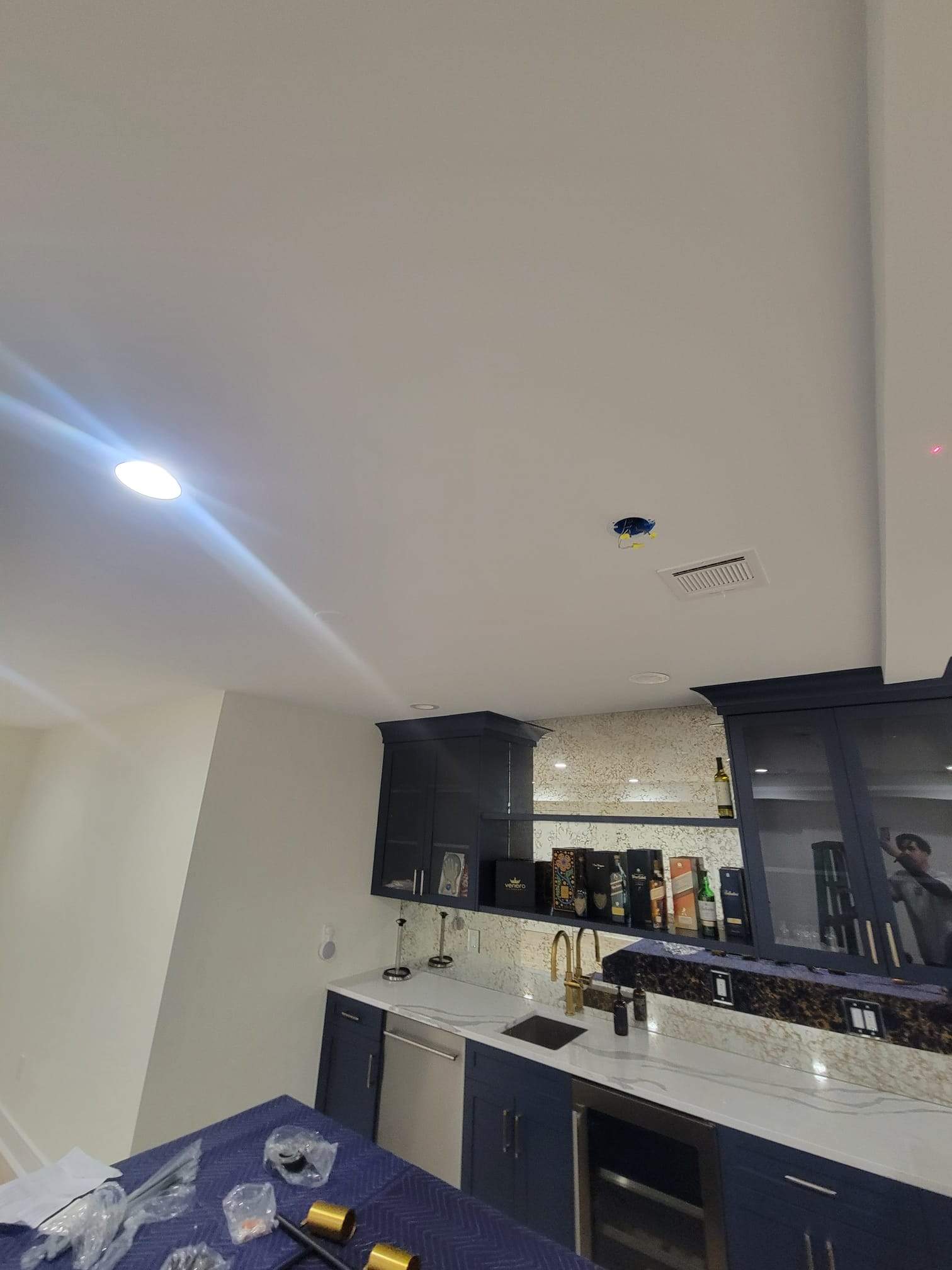 Chandelier and lift installation by Staybright Electric
