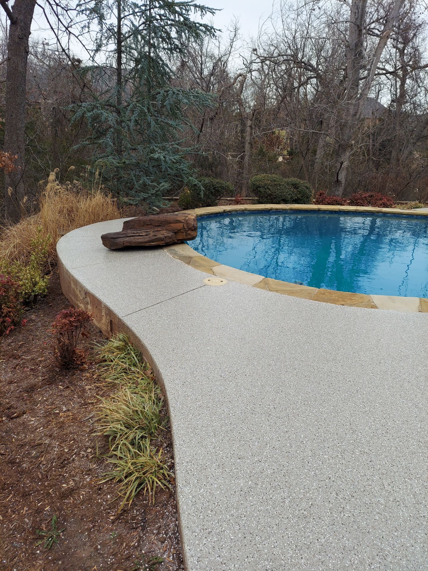Pool Deck Install with Pebble Beach by Copperhead Coatings