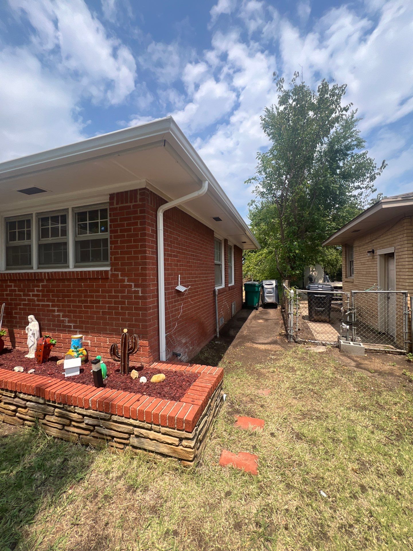 Roof Replacement and Gutter Installation in Oklahoma City, OK by McCann's Roofing and Construction