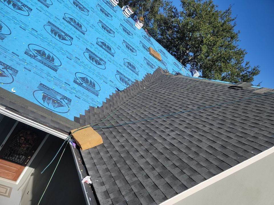 Residential Roofing Installation using Roof Replacement by American Roofing & Construction LLC